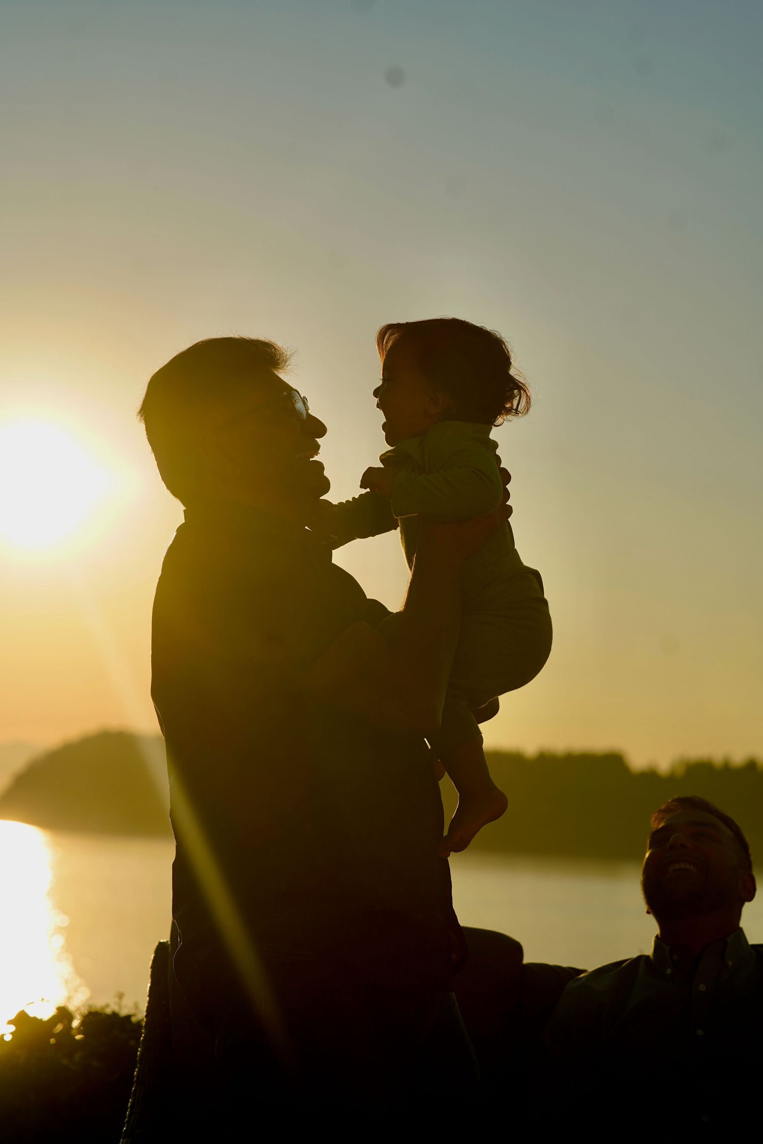 Family enjoying a relaxed outdoor photo session in Port Townsend, Washington