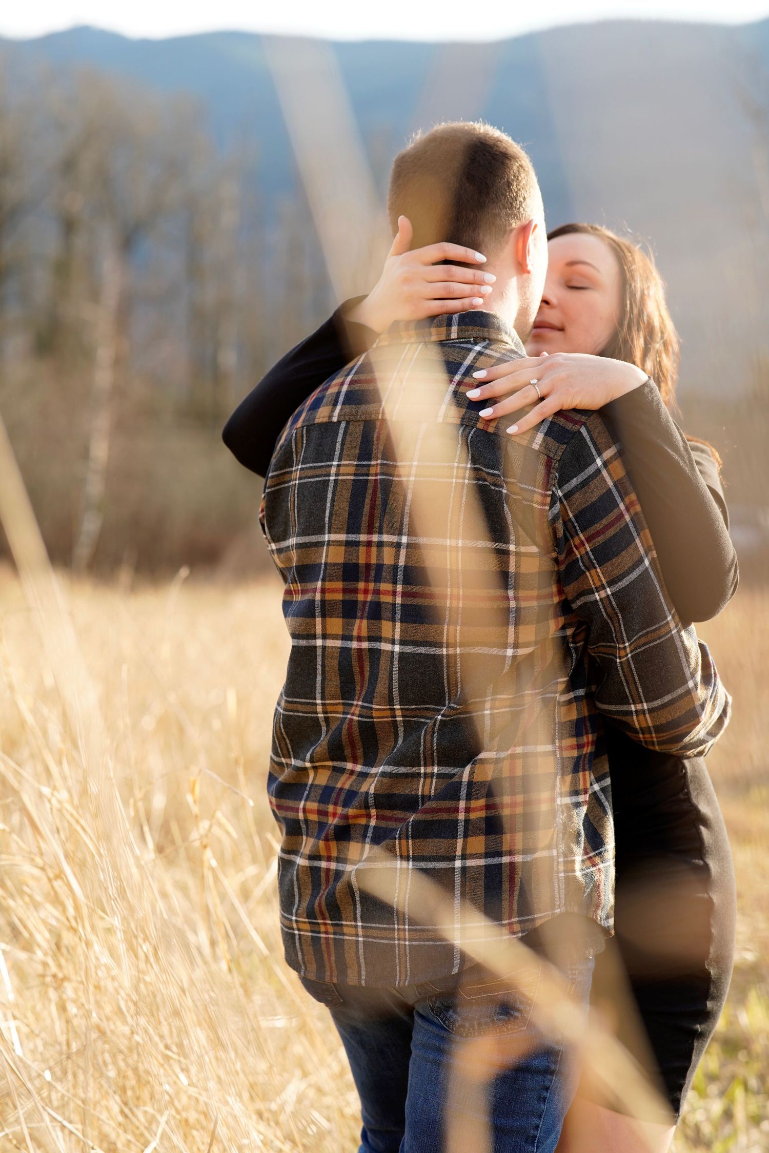 Couple celebrating their engagement during a relaxed photography session in Port Townsend, Washington