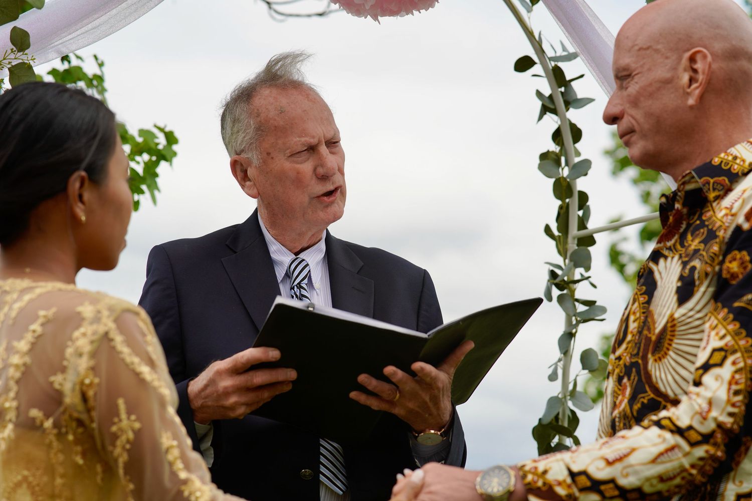 Bride and groom sharing a moment during an intimate wedding ceremony in Port Townsend, Washington
