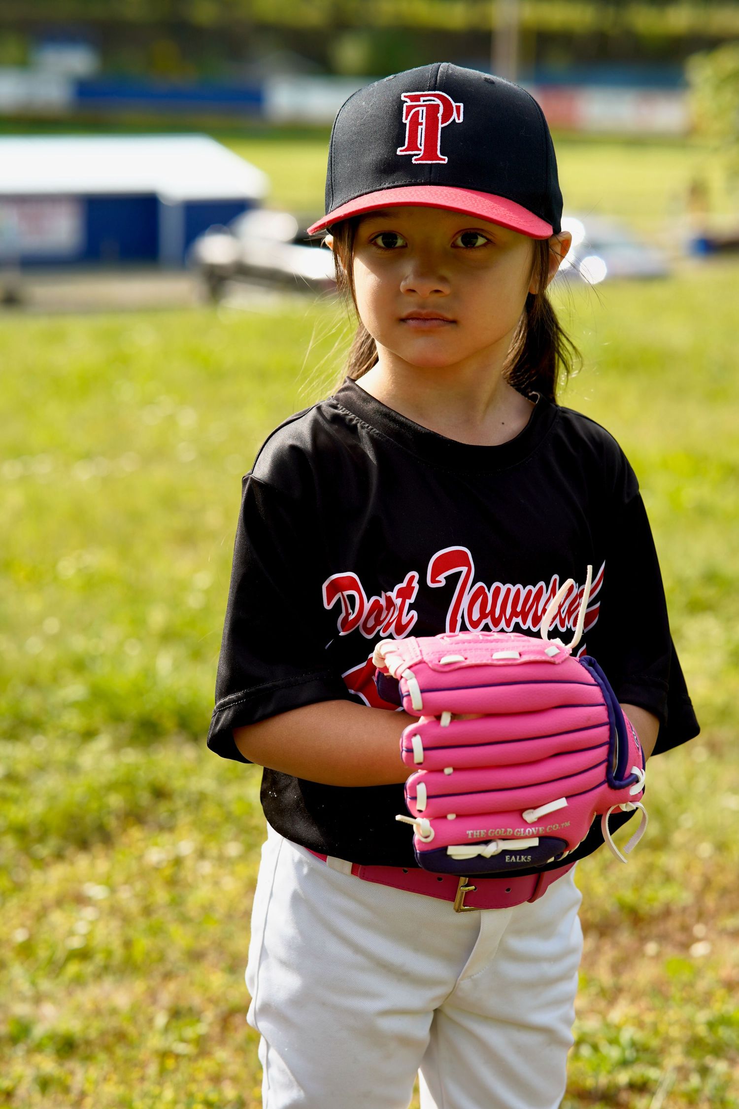oung baseball player posing for professional sports portraits in Port Townsend, Washington.