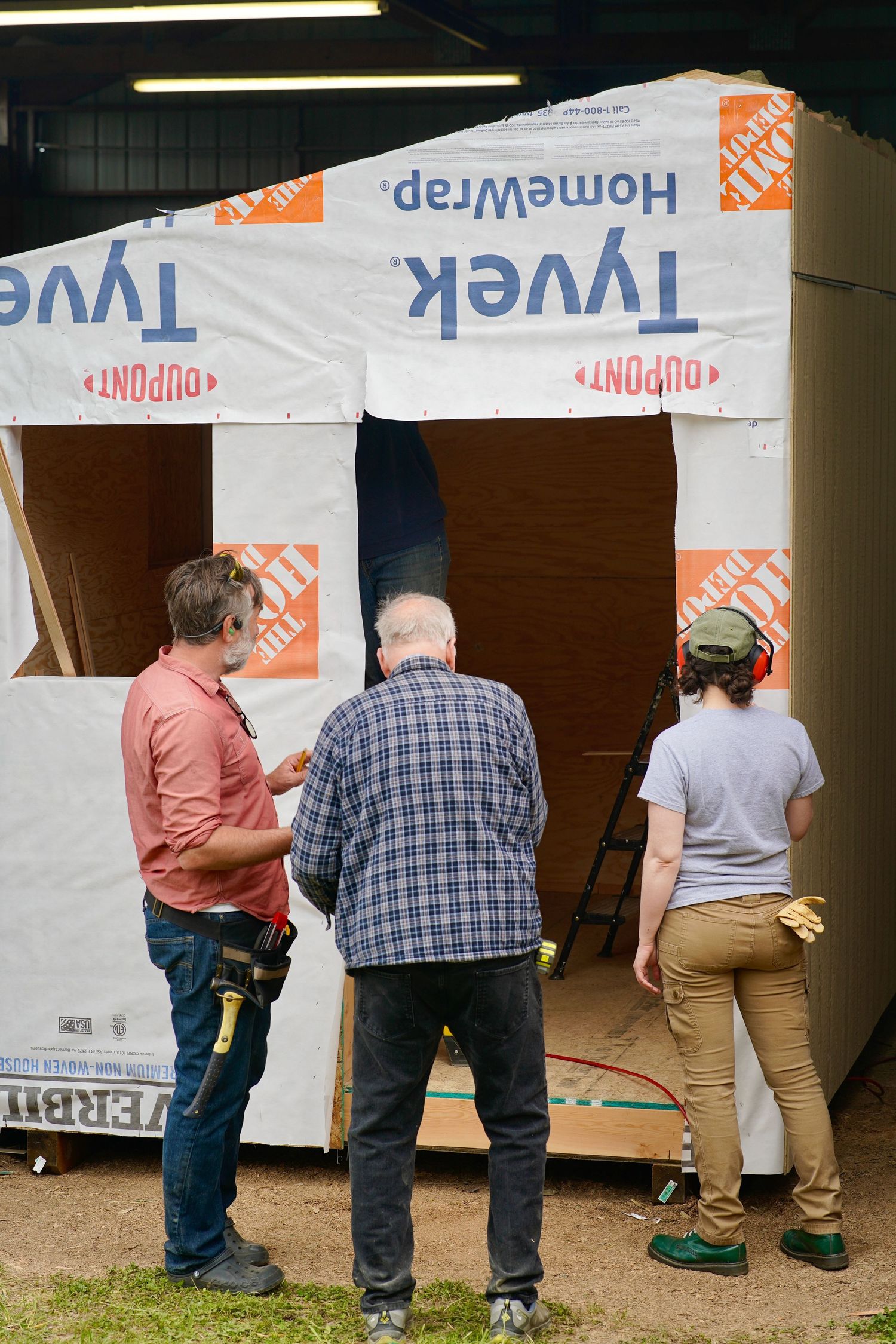 Builders working on a nonprofit tiny home project in Port Townsend, Washington
