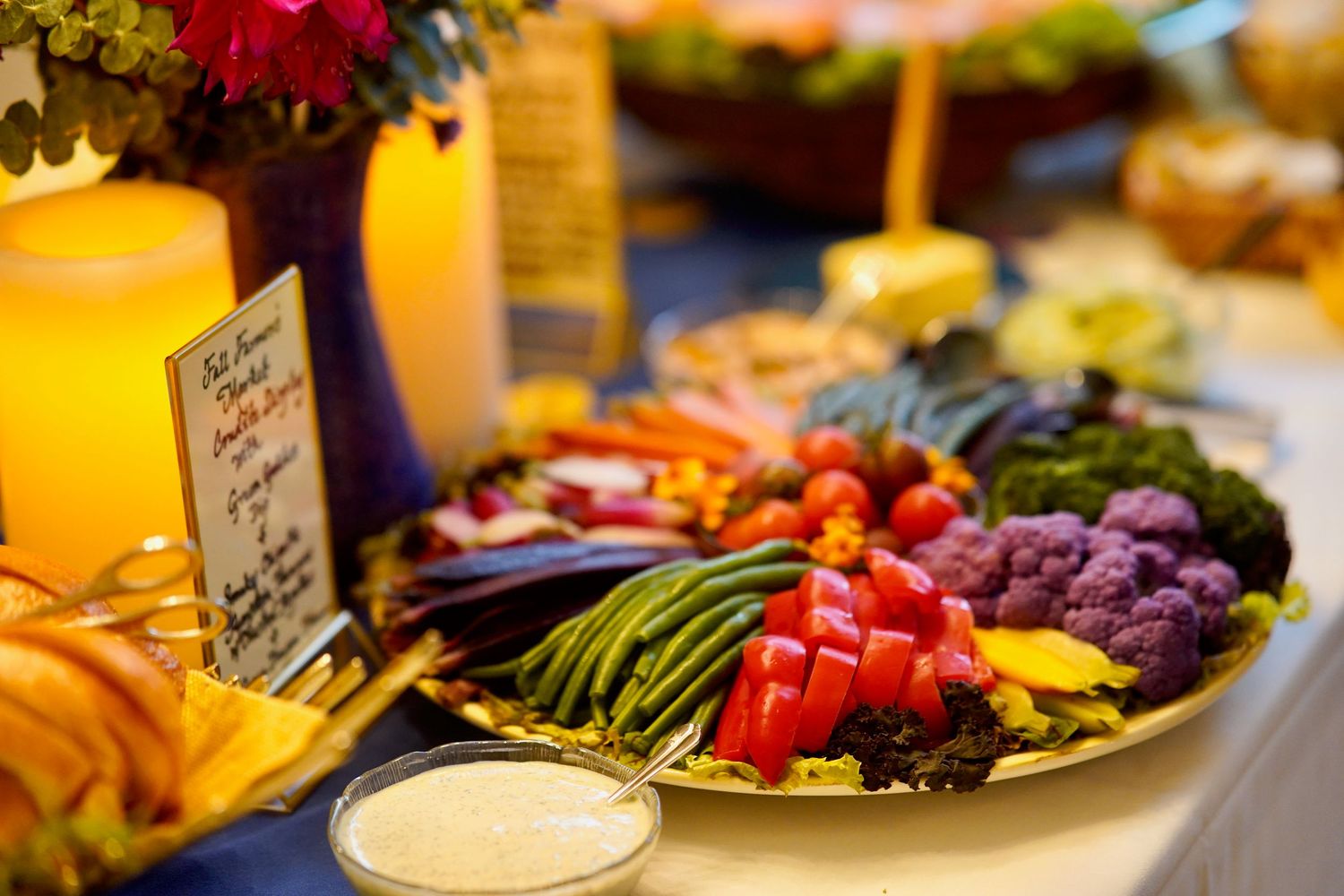 Assorted farm-fresh appetizers and desserts arranged on a table at a family celebration in Port Townsend, Washington