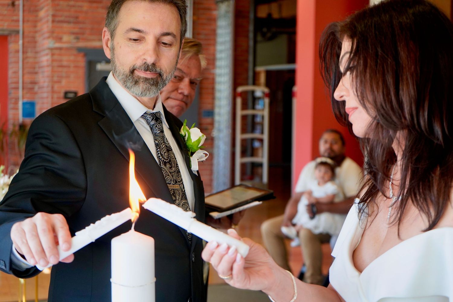Bride and groom sharing a moment during an intimate wedding ceremony in Port Townsend, Washington