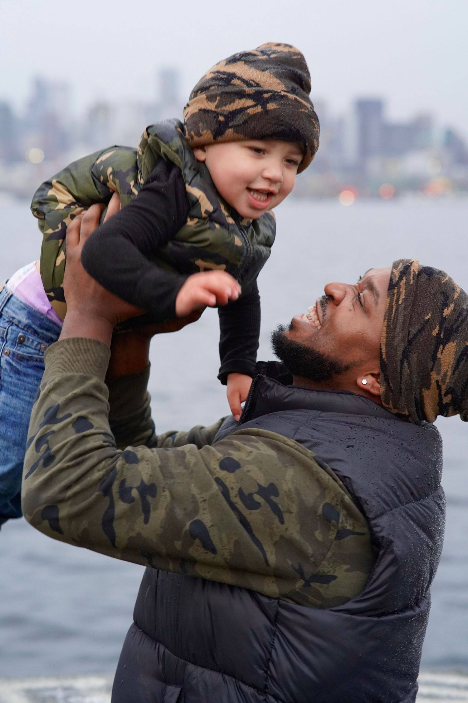 Family enjoying a relaxed outdoor photo session in Port Townsend, Washington