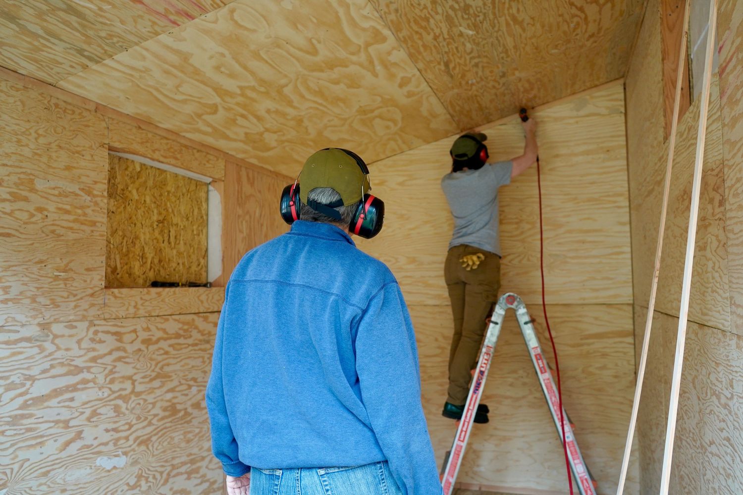 Builders working on a nonprofit tiny home project in Port Townsend, Washington