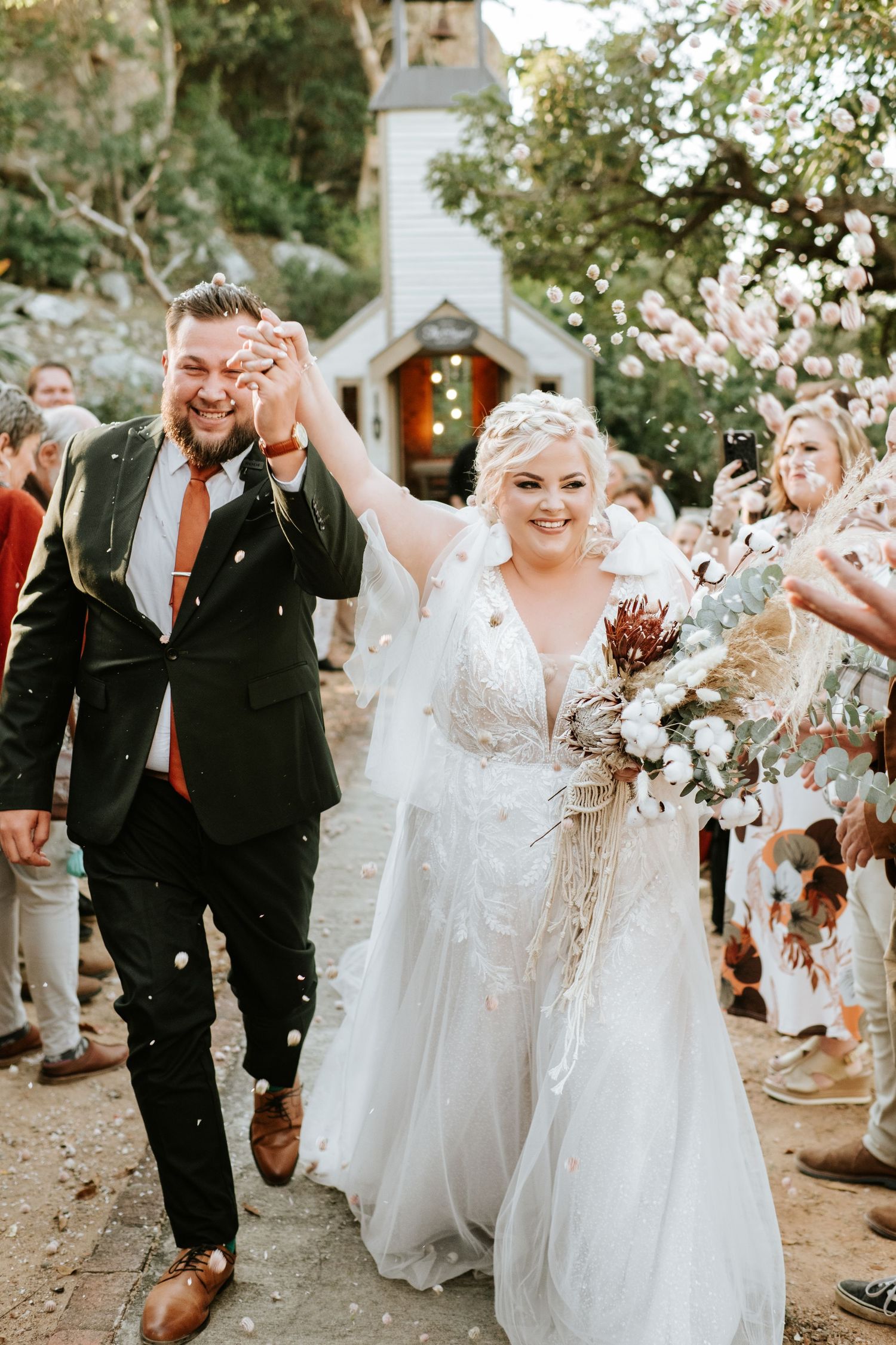 Walking through the confetti aisle, confident and proud