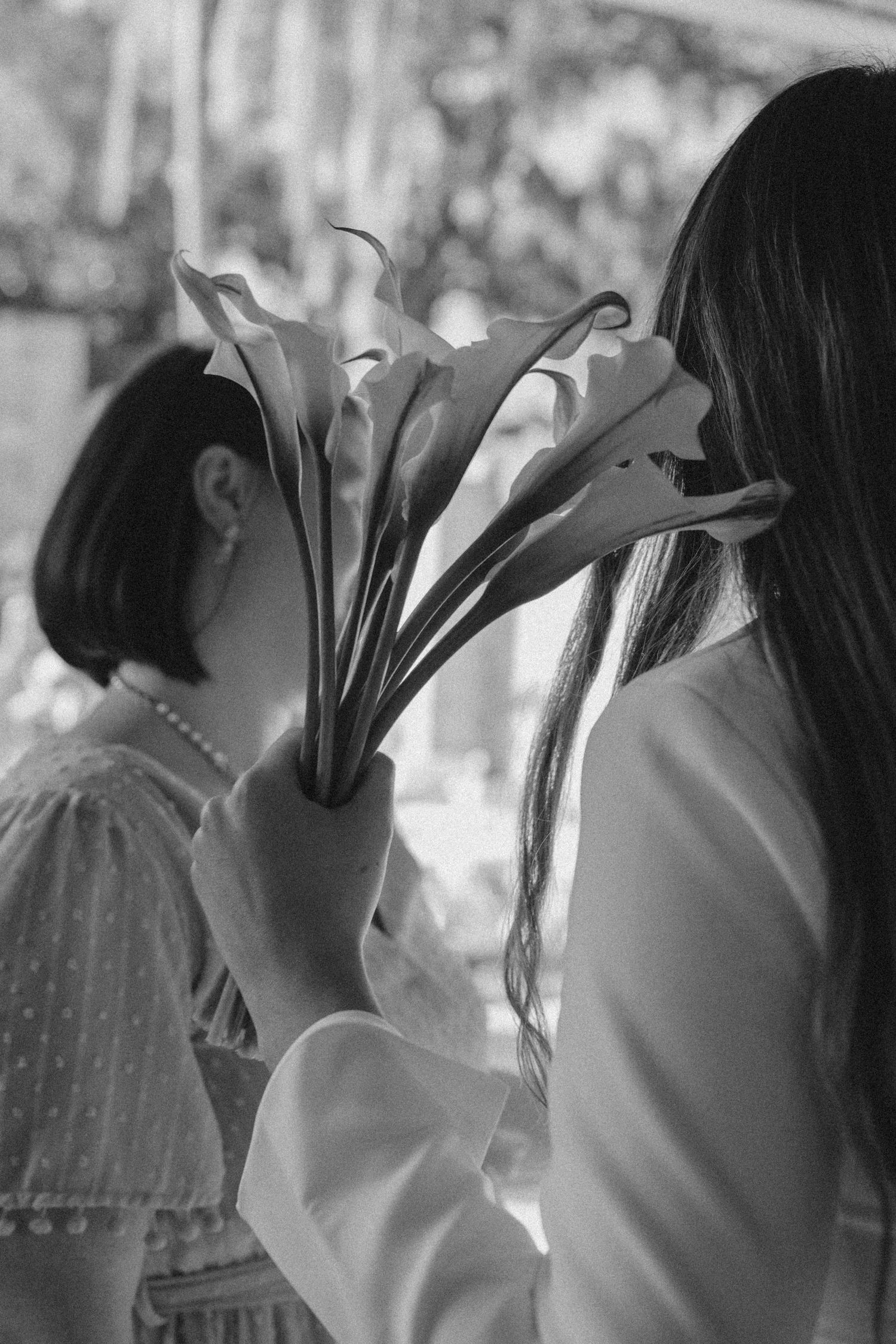 Series of black and white romantic photos showing couple sharing intimate moments together.