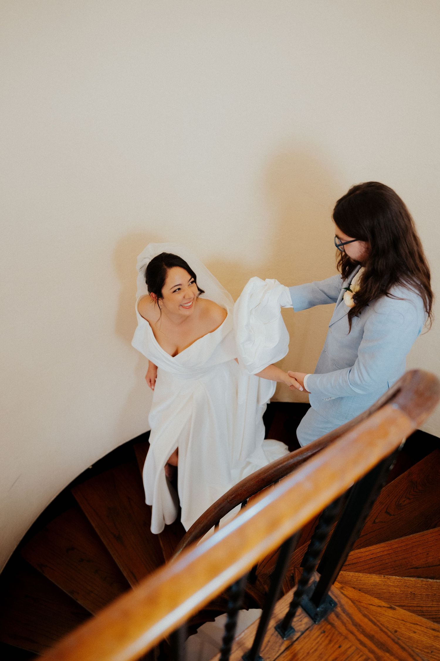 Series of candid shots showing two people interacting on a wooden staircase.
