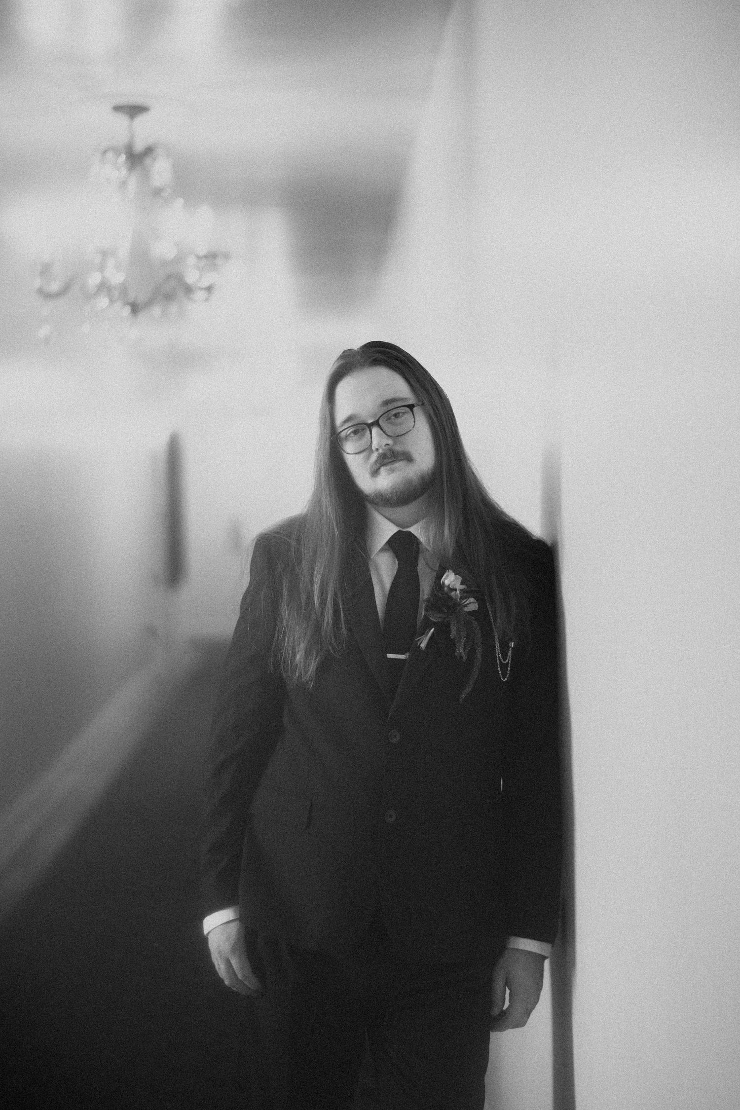 Black and white artistic portrait series in a soft, dreamy style with blurred edges.