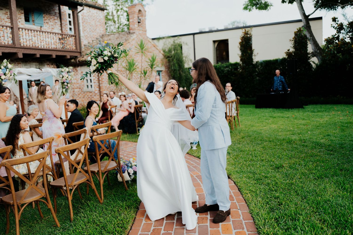 Bride walks down the isle at the Casa Feliz venue in Winter Park