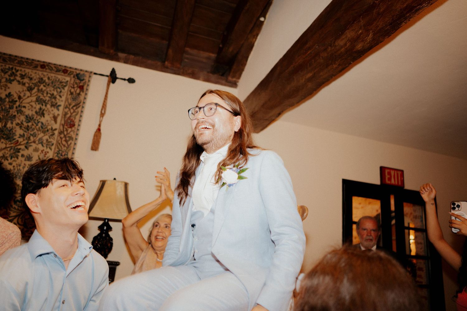 A series of vintage-style photographs showing people in casual poses against rustic interior backgrounds.