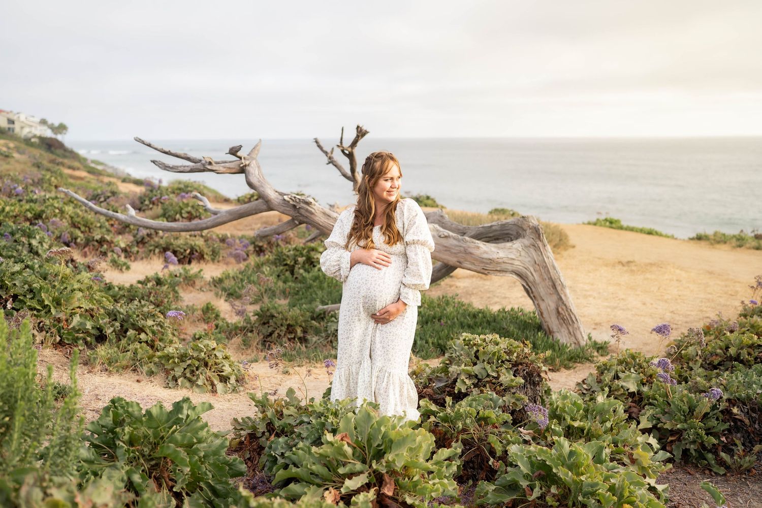 breyman photography san diego photographer carlsbad beach maternity neutral beige sunset warm mom motherhood pregnancy baby bump flower