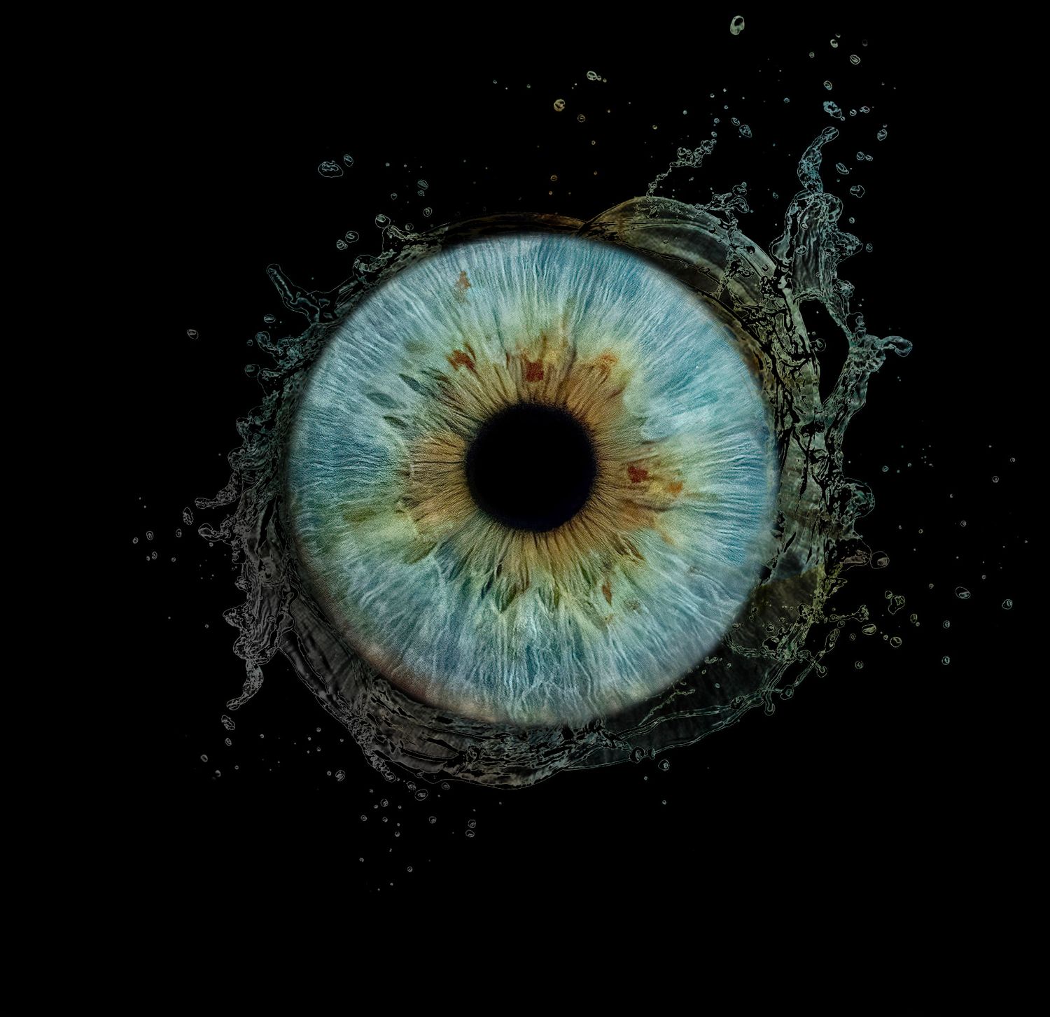 A blue-green human eye dramatically surrounded by a dark water splash on black background.