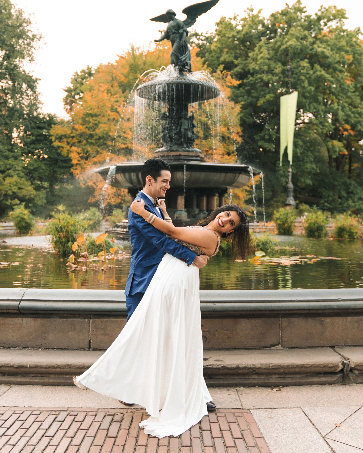 Elopement photography in Central Park NYC in front of fountain.