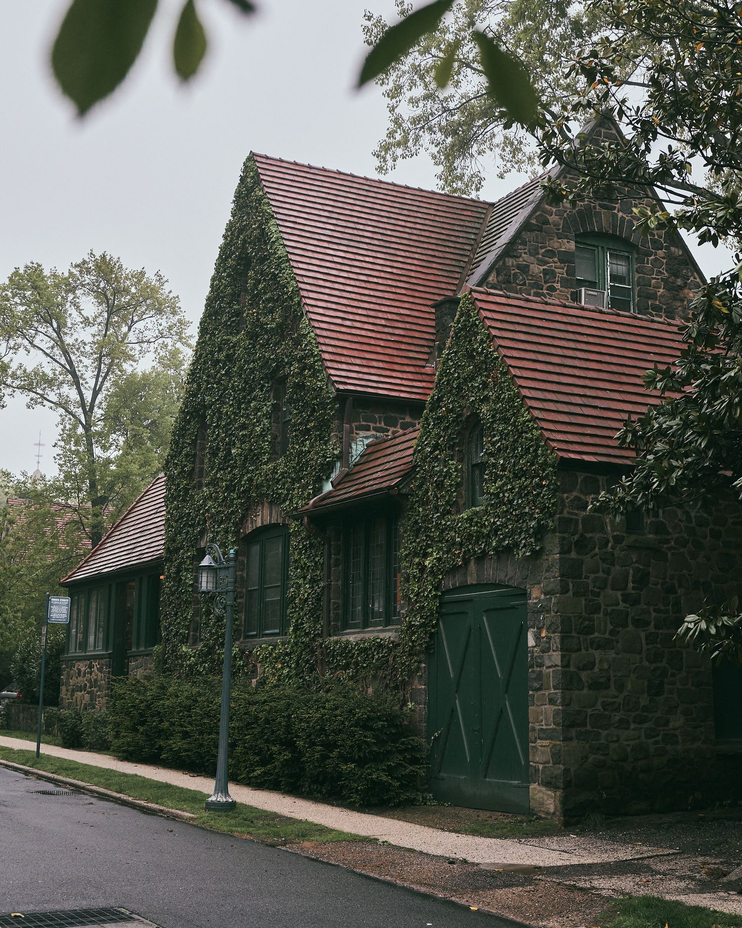 Location photo of vine covered building in Forest Hills Gardens.