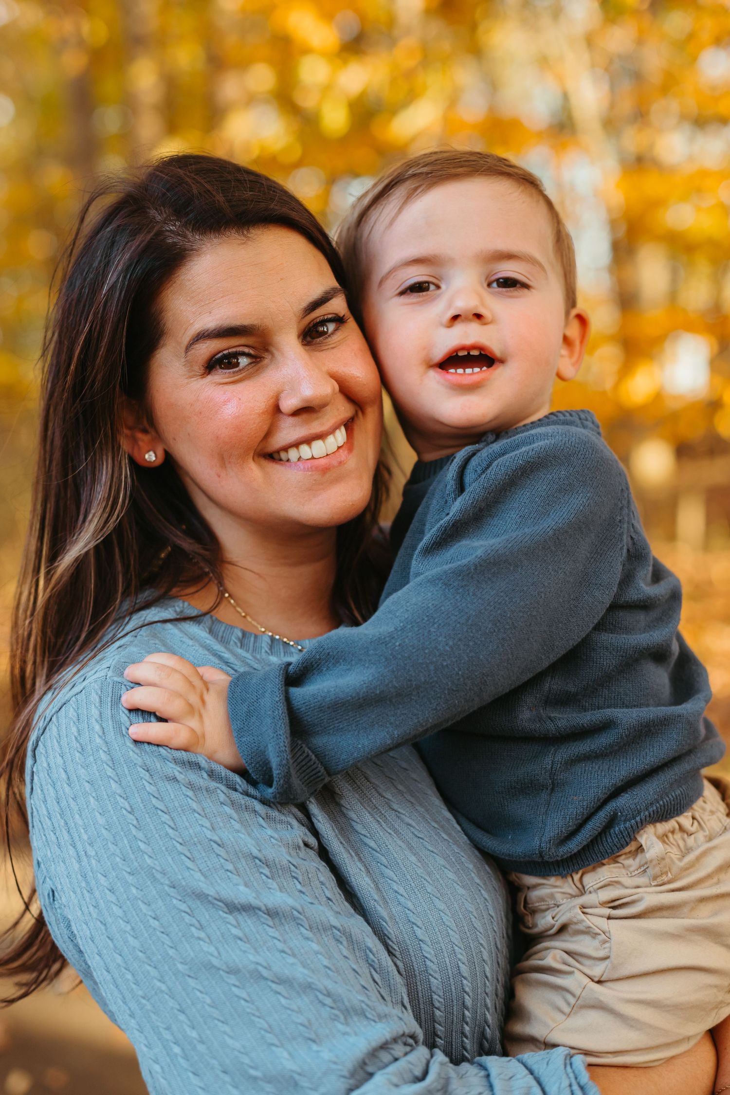 A joyful autumn moment captured in a series of candid photos showing affectionate interaction against golden fall foliage.