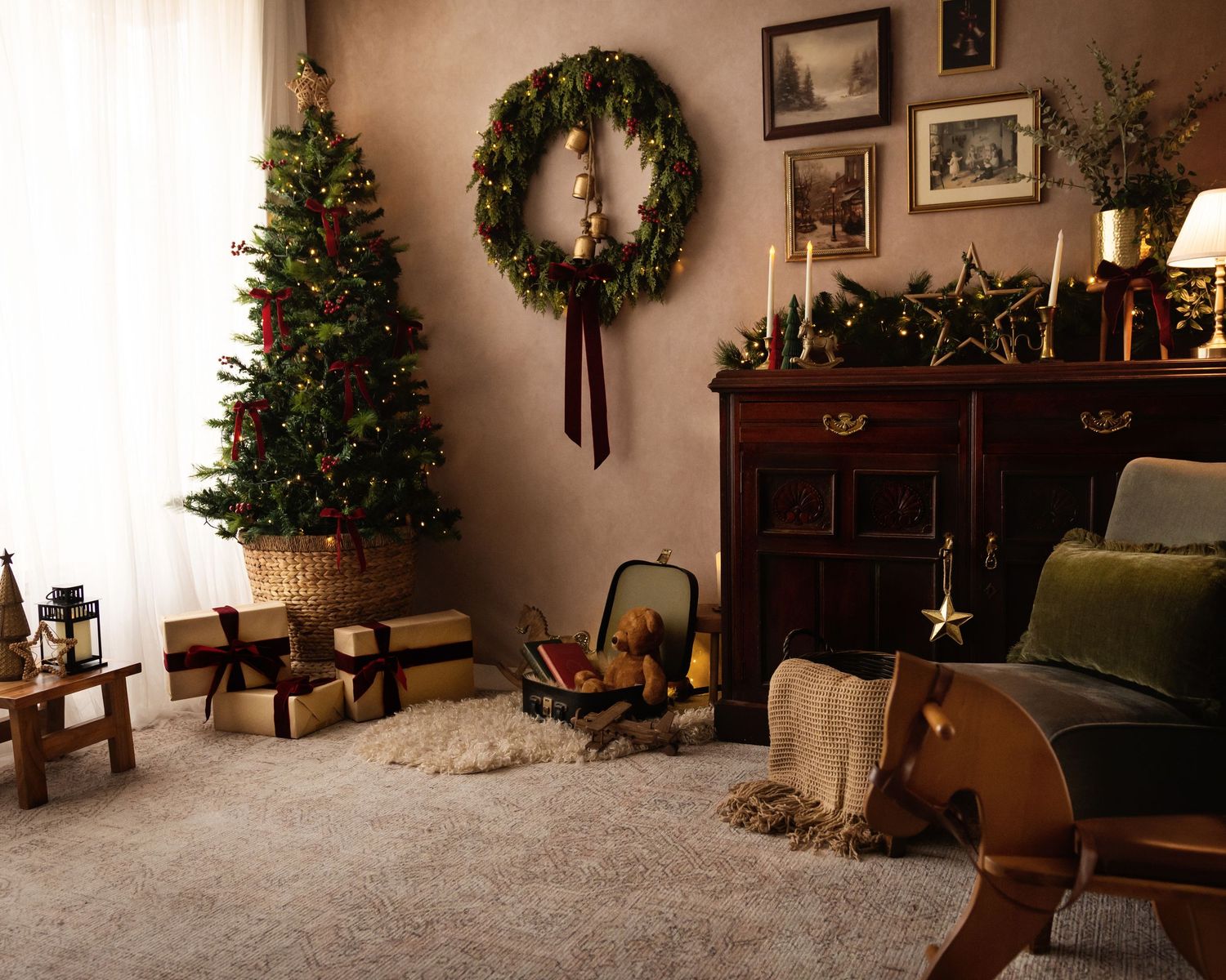 Cozy Christmas living room with decorated tree, wreath, gifts, candles, and festive garland on a wooden fireplace mantel.
