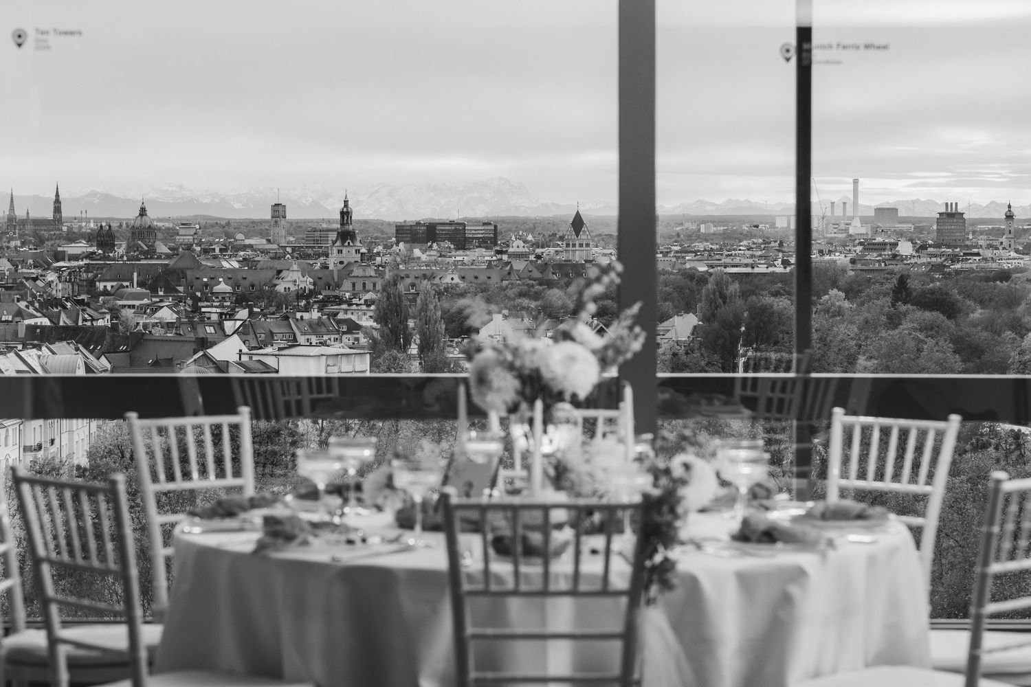 A panoramic view of Glasgow's historic city skyline with church spires and buildings stretching across the horizon.