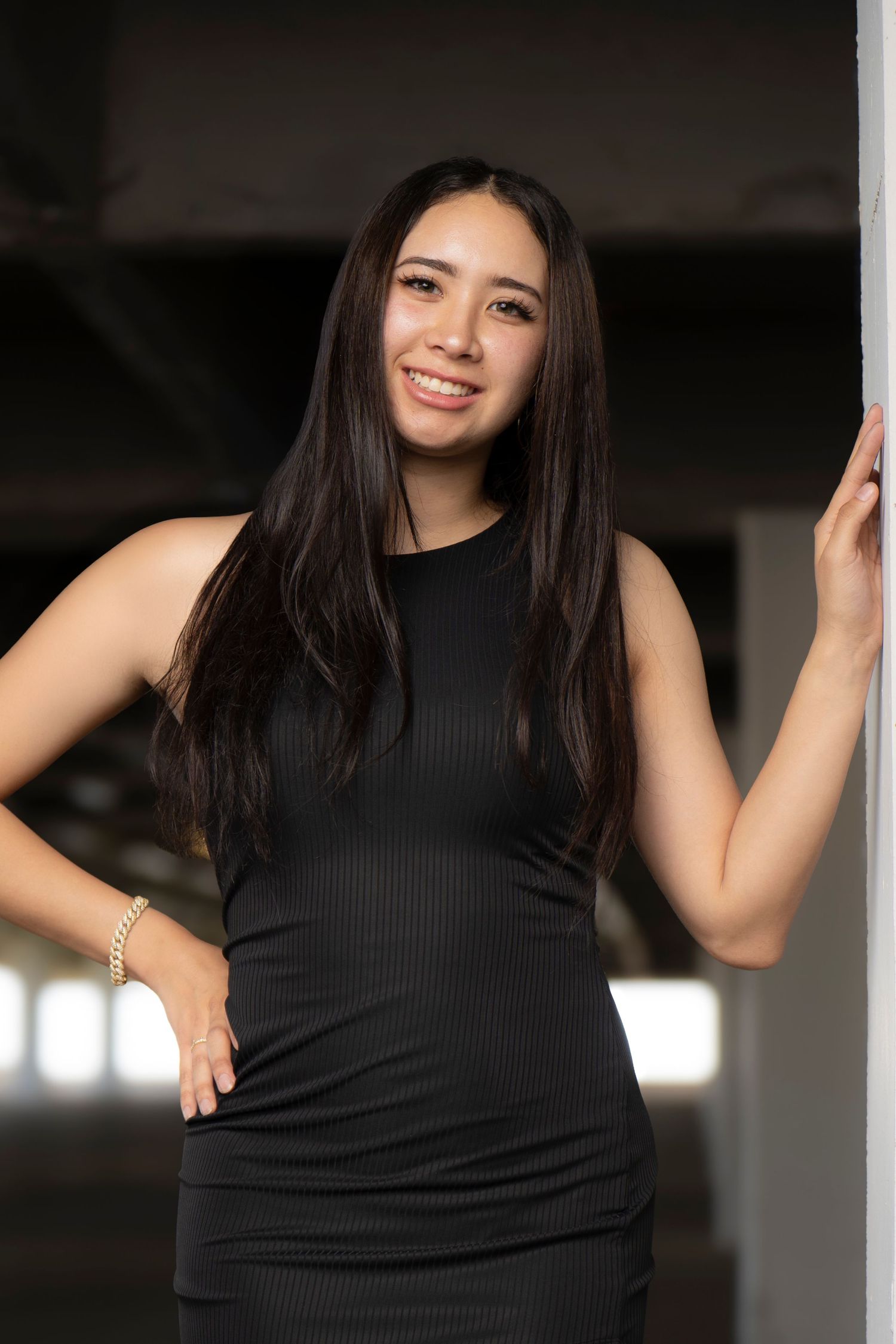 Portrait of Medaly Gutierrez, a Houston-based photographer specializing in editorial-style personal branding photography