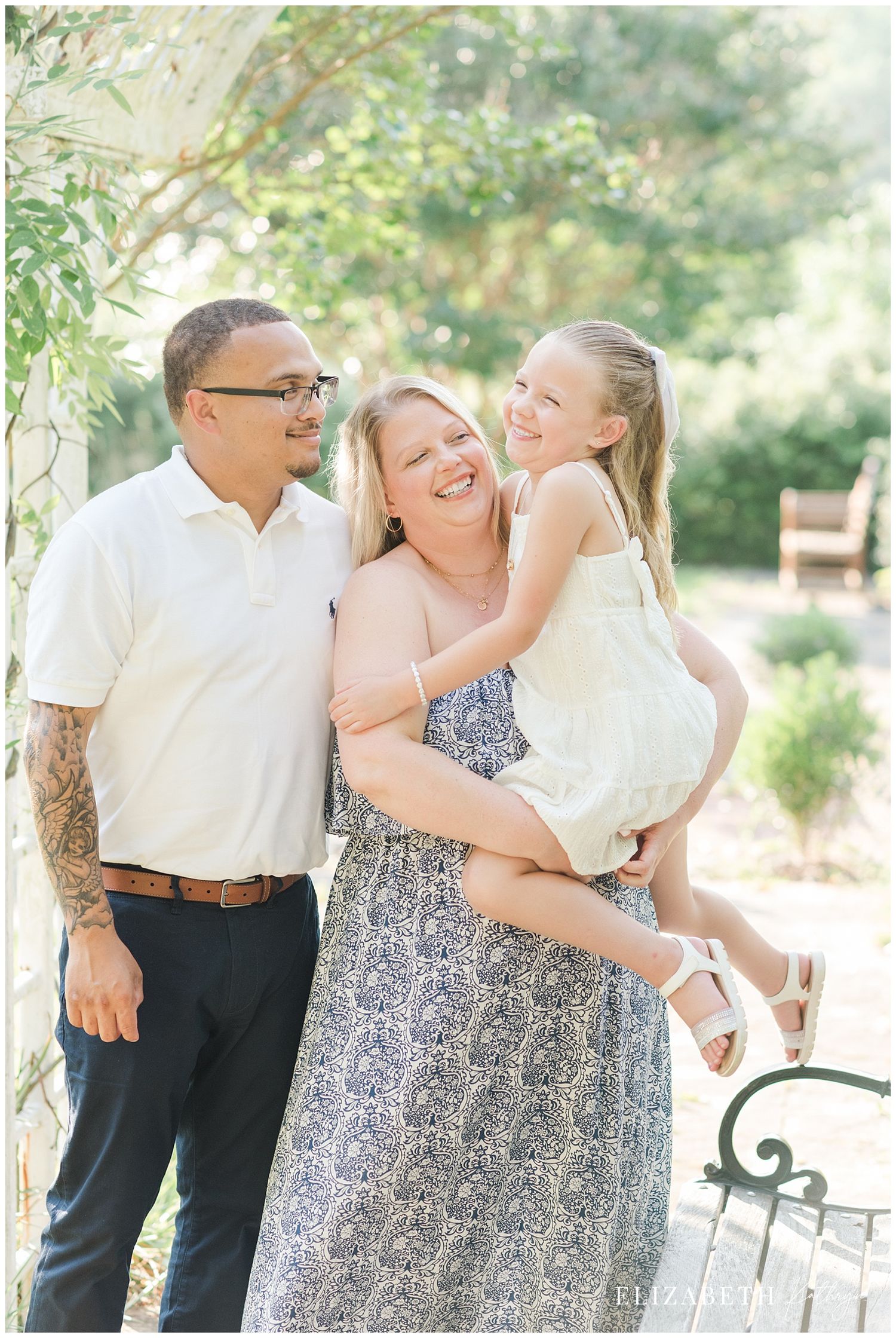 A series of tender family moments captured outdoors in a garden setting with white clothing and floral patterns.