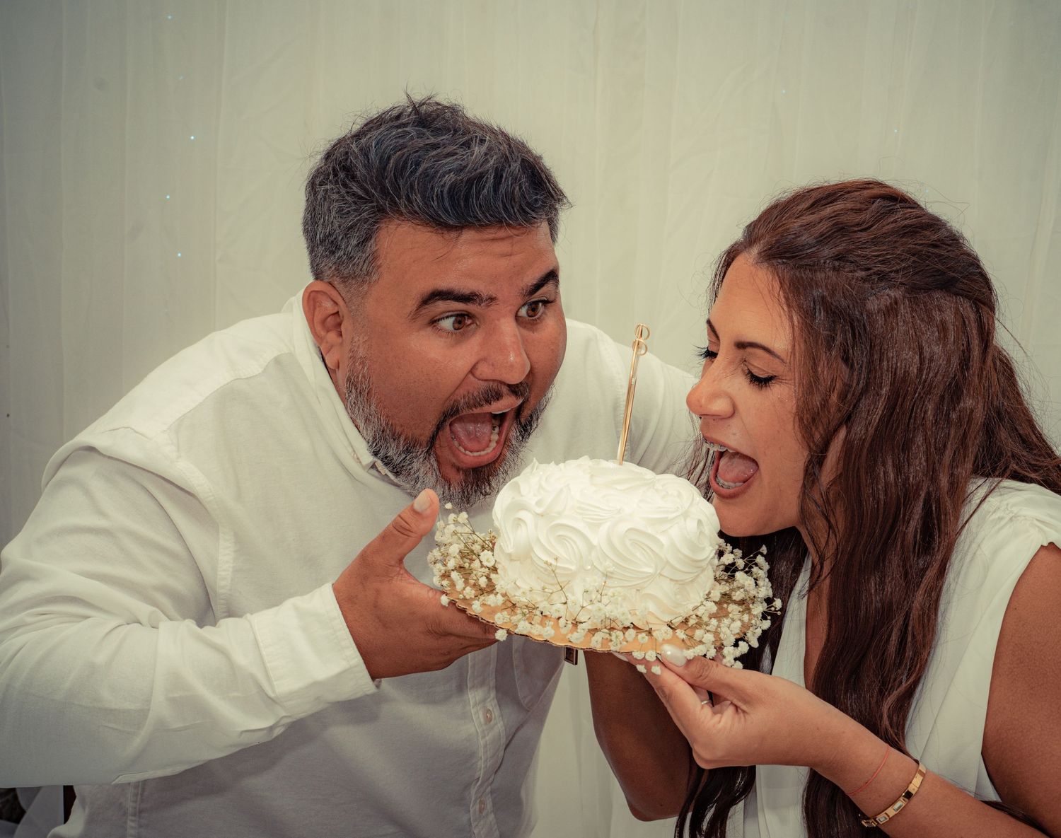 Two people playfully sharing a slice of cake in a series of candid photos.