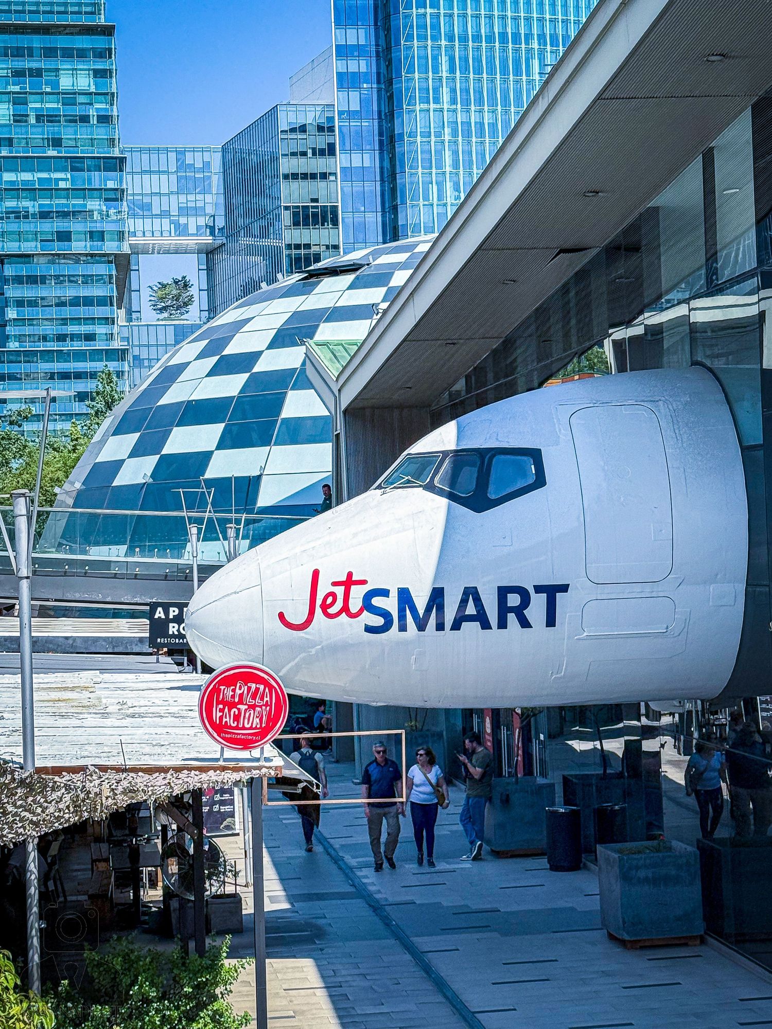 JetSMART Airlines aircraft nose and branding displayed at airport terminal.