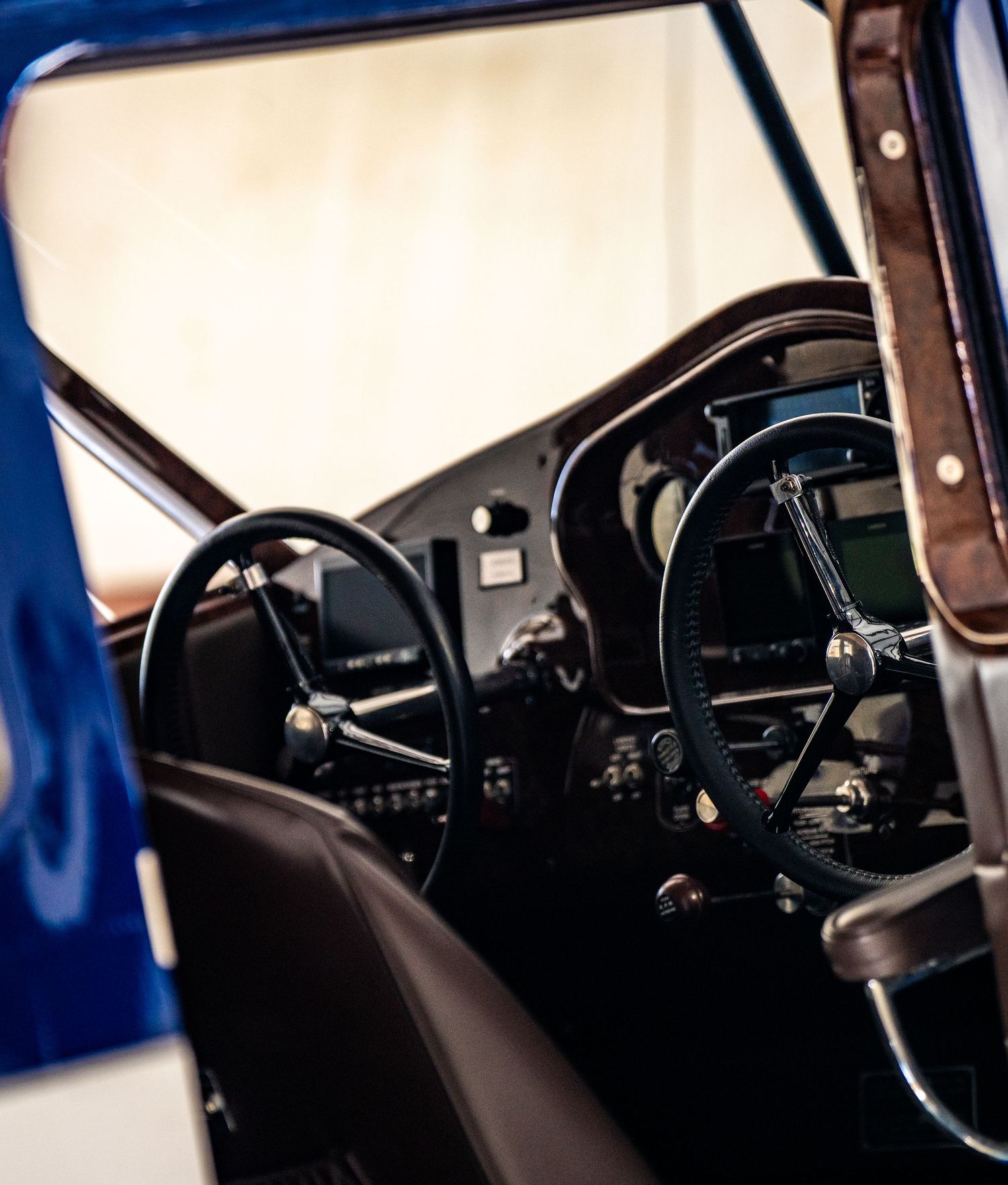 Interior cockpit view showing vintage style flight instruments and controls.