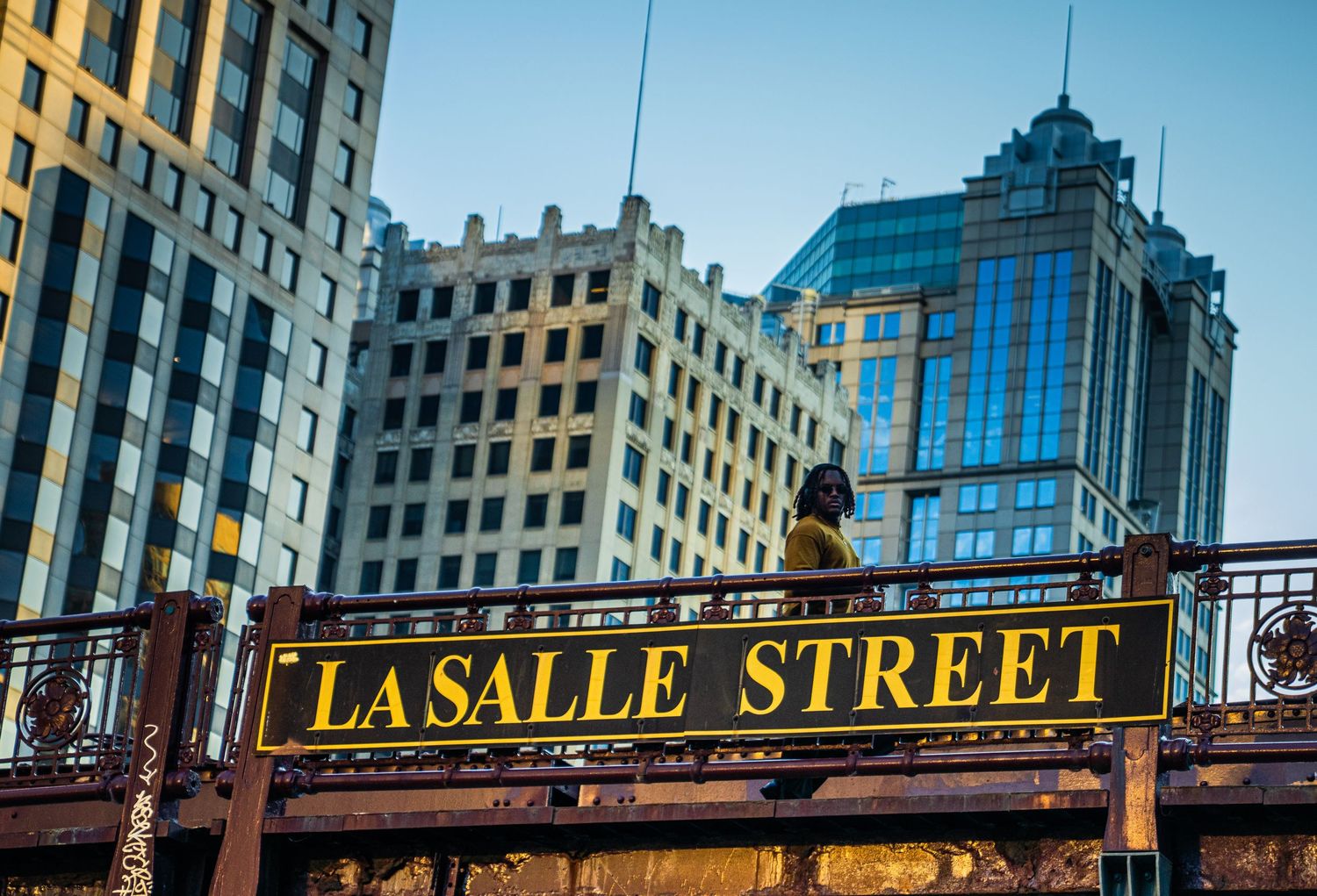 Intersection sign of LaSalle Street in Chicago's financial district with historic architecture visible.