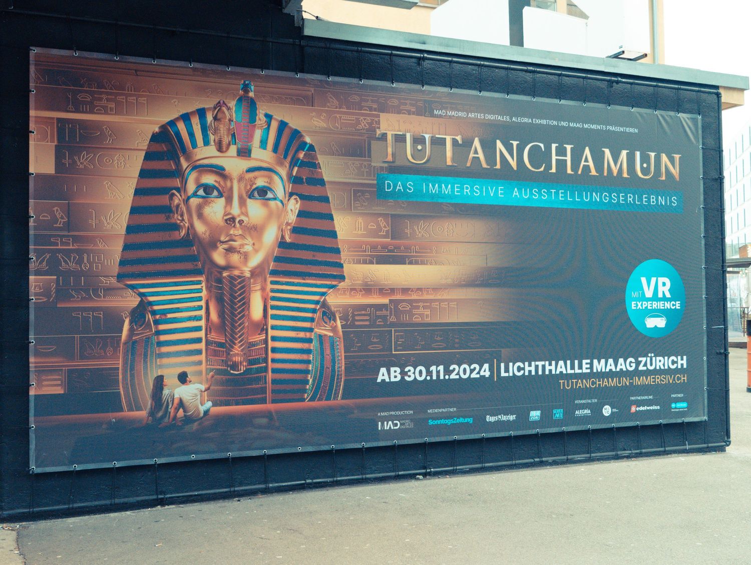 Panoramic view of Tutankhamun exhibition advertising banners.