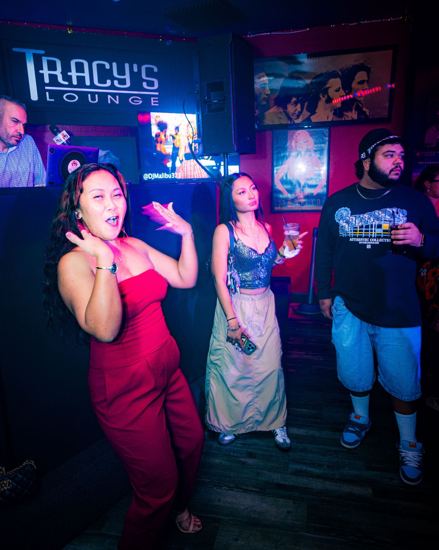 Interior of Tracy's Lounge with patrons dancing and enjoying the nightclub atmosphere.