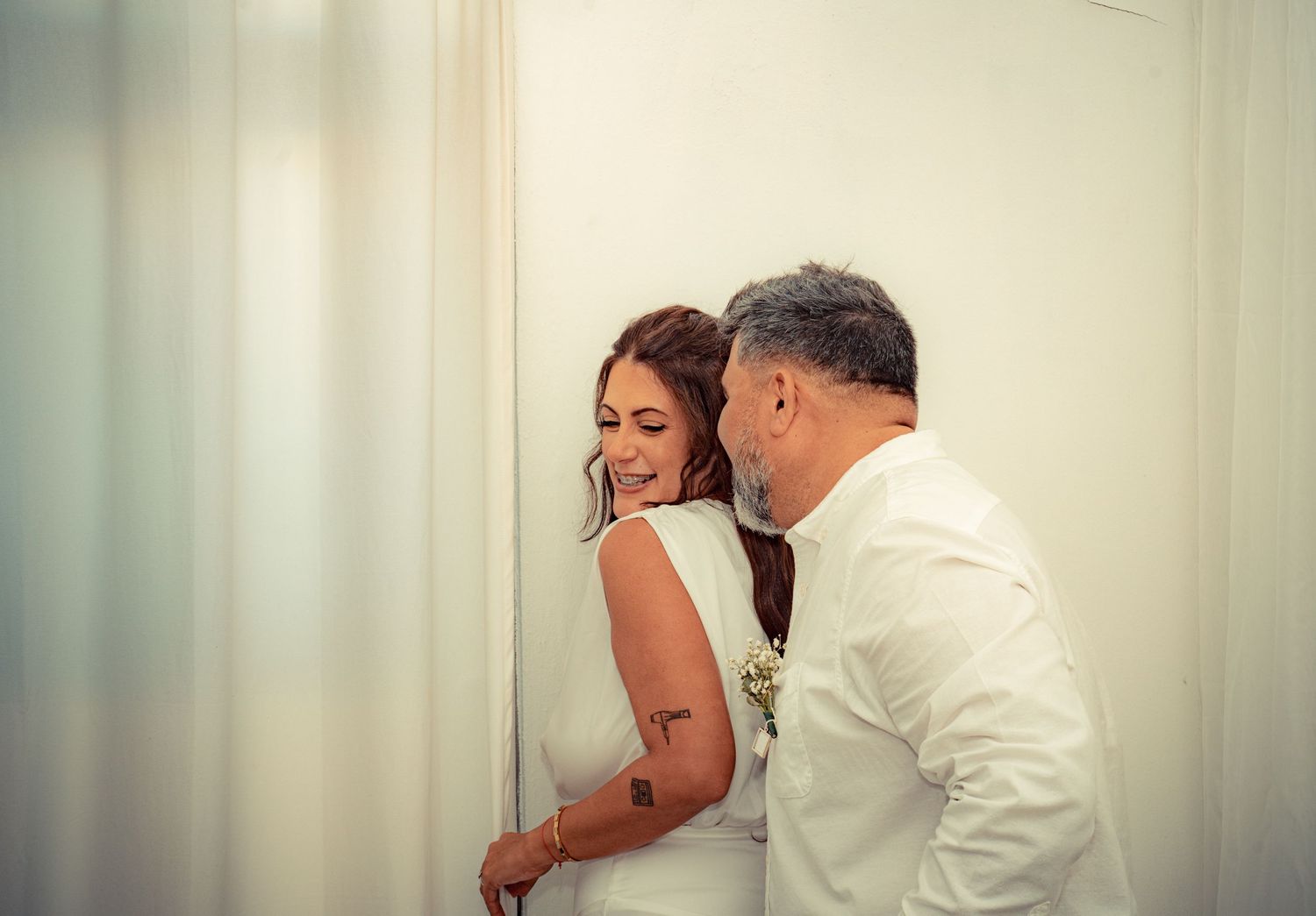 A romantic wedding couple shares intimate moments in a series of candid photographs against a white background.