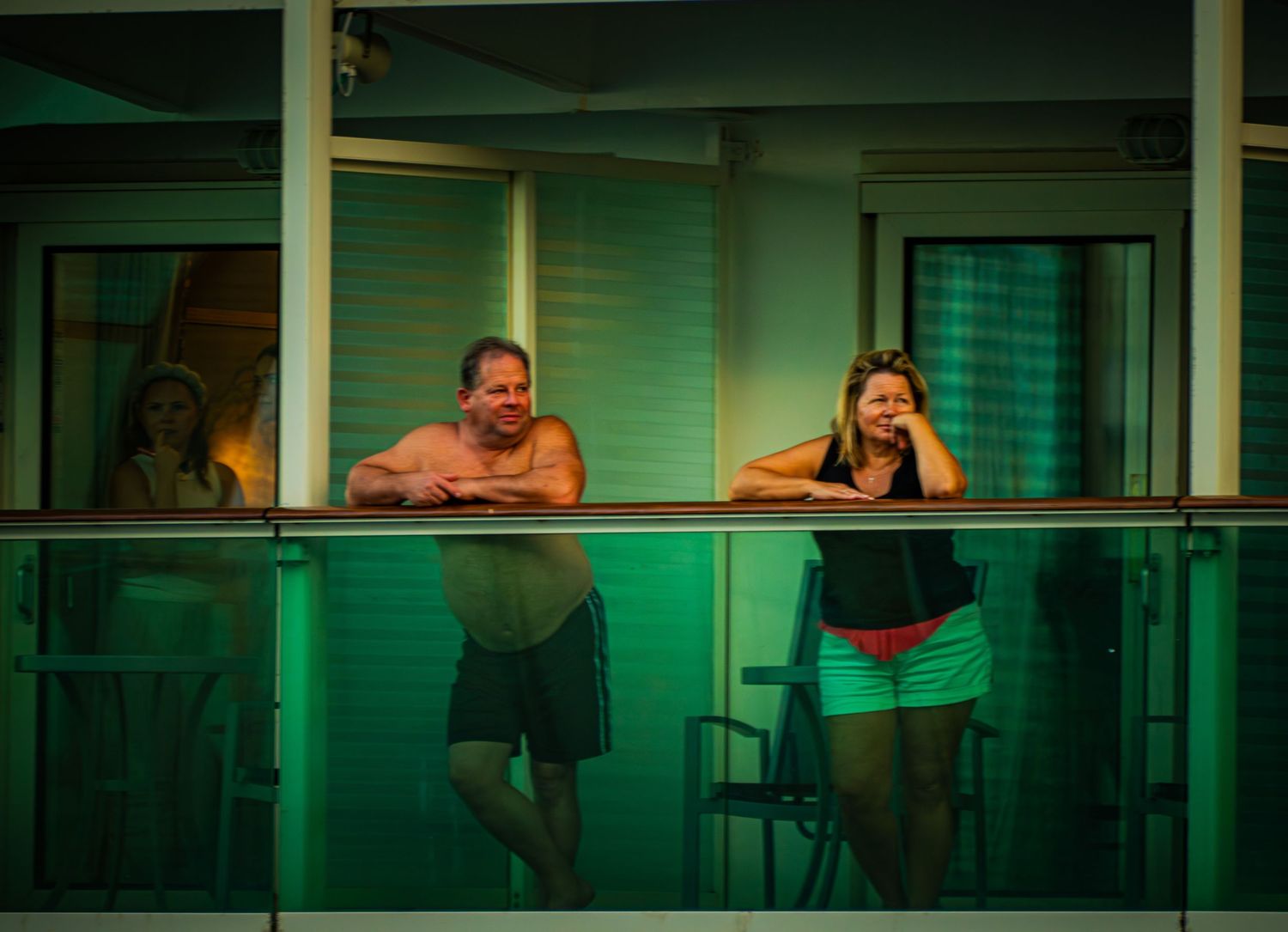 Three dramatic green-tinted theater scenes showing performers on stage during an emotional performance.