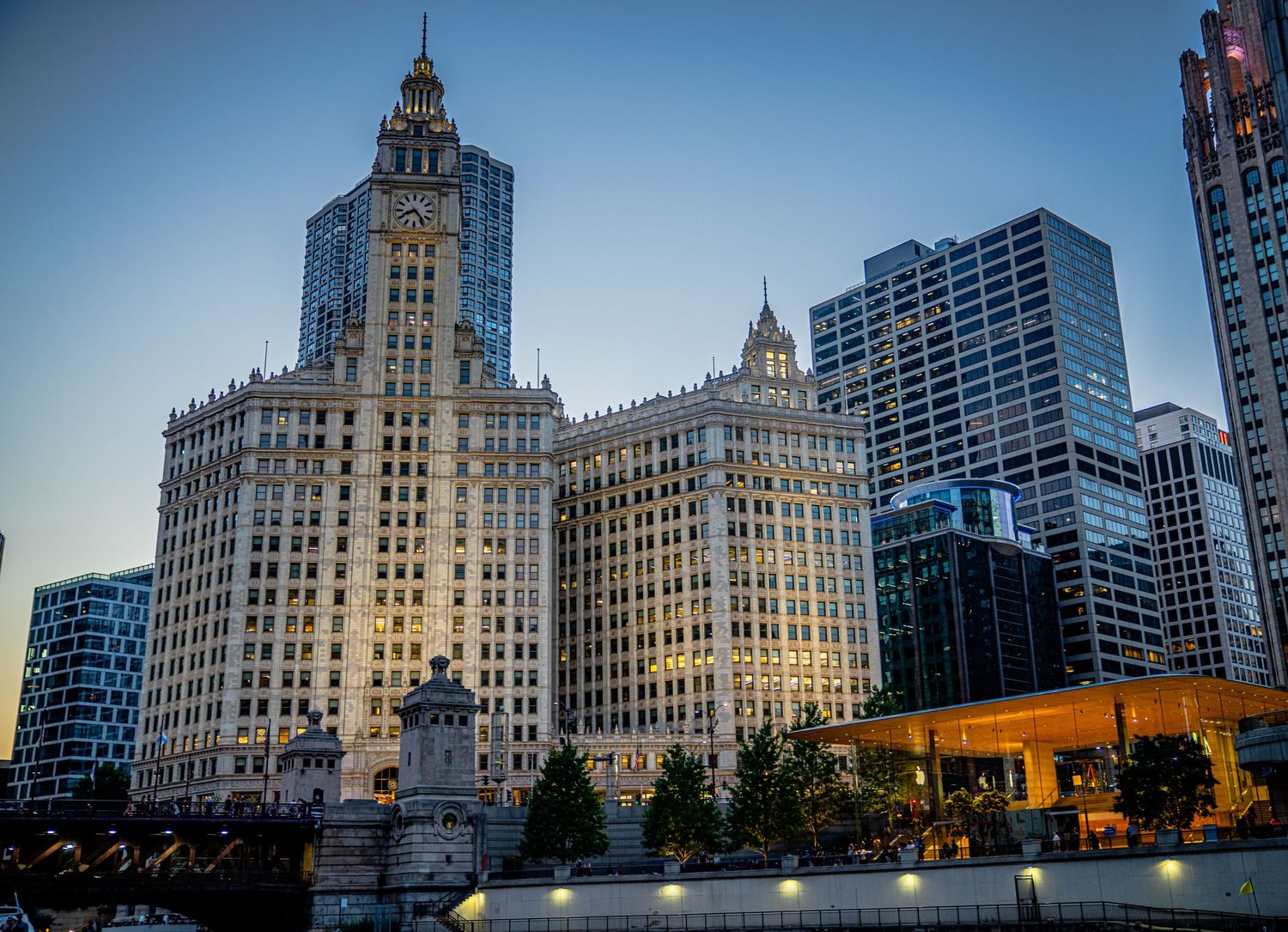 Historic architectural buildings line a city street with ornate facades and details.