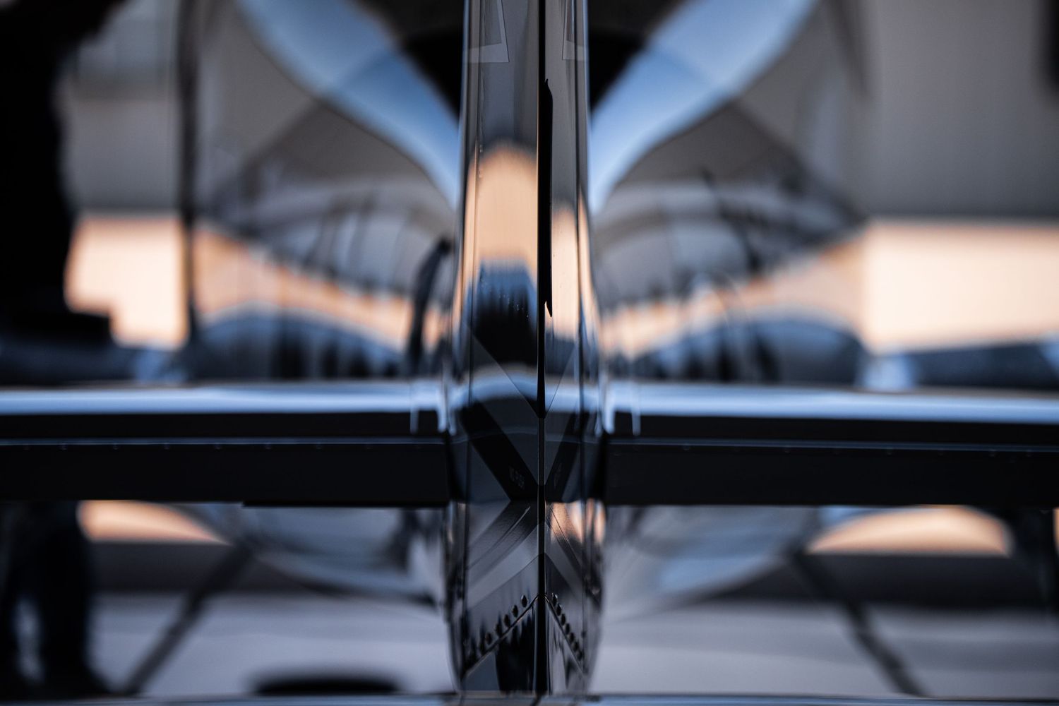 Close-up view of airplane cockpit instruments and controls in dramatic lighting.