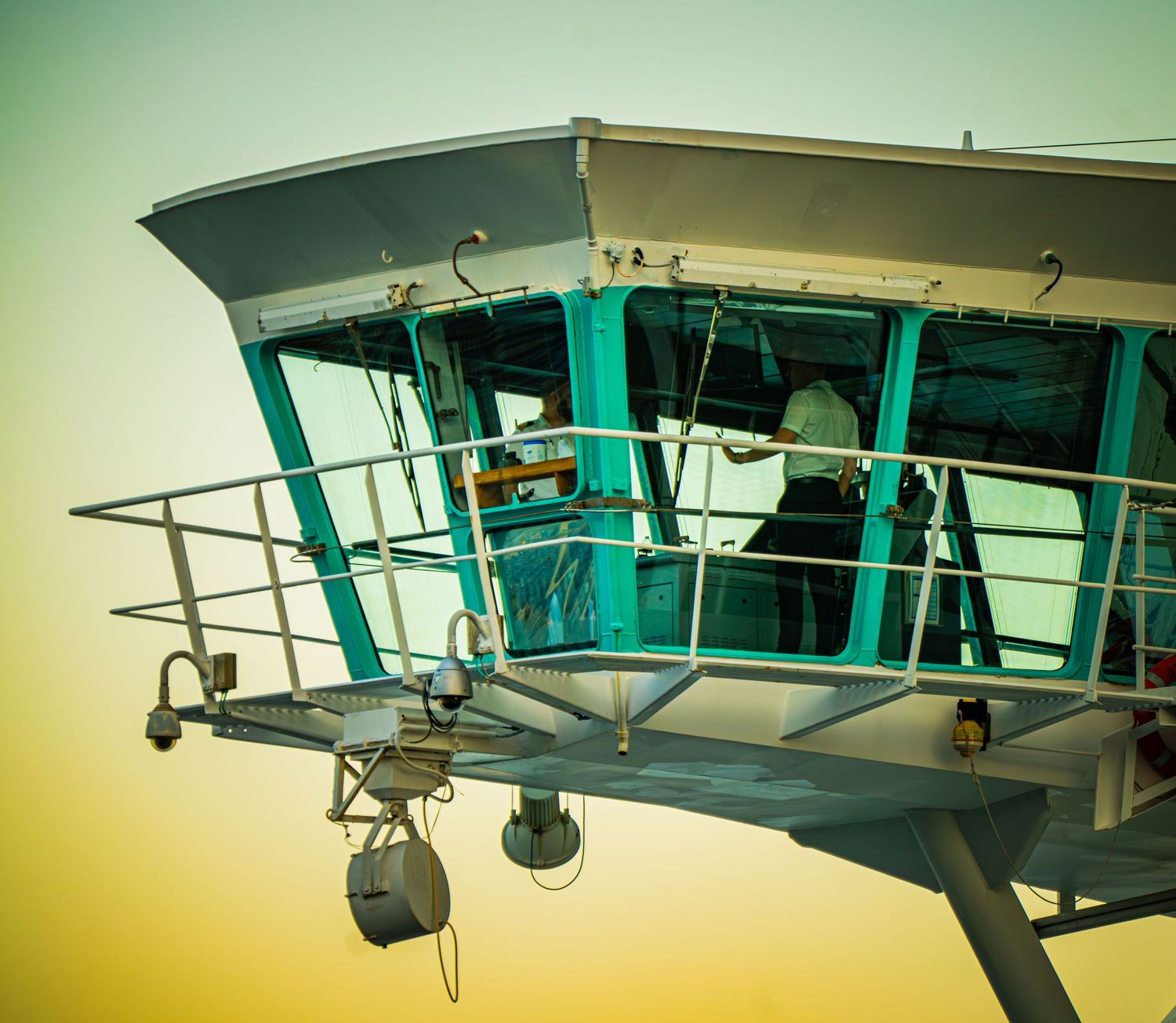A sequence of images showing a vintage biplane aircraft from different angles against a green and yellow tinted sky.