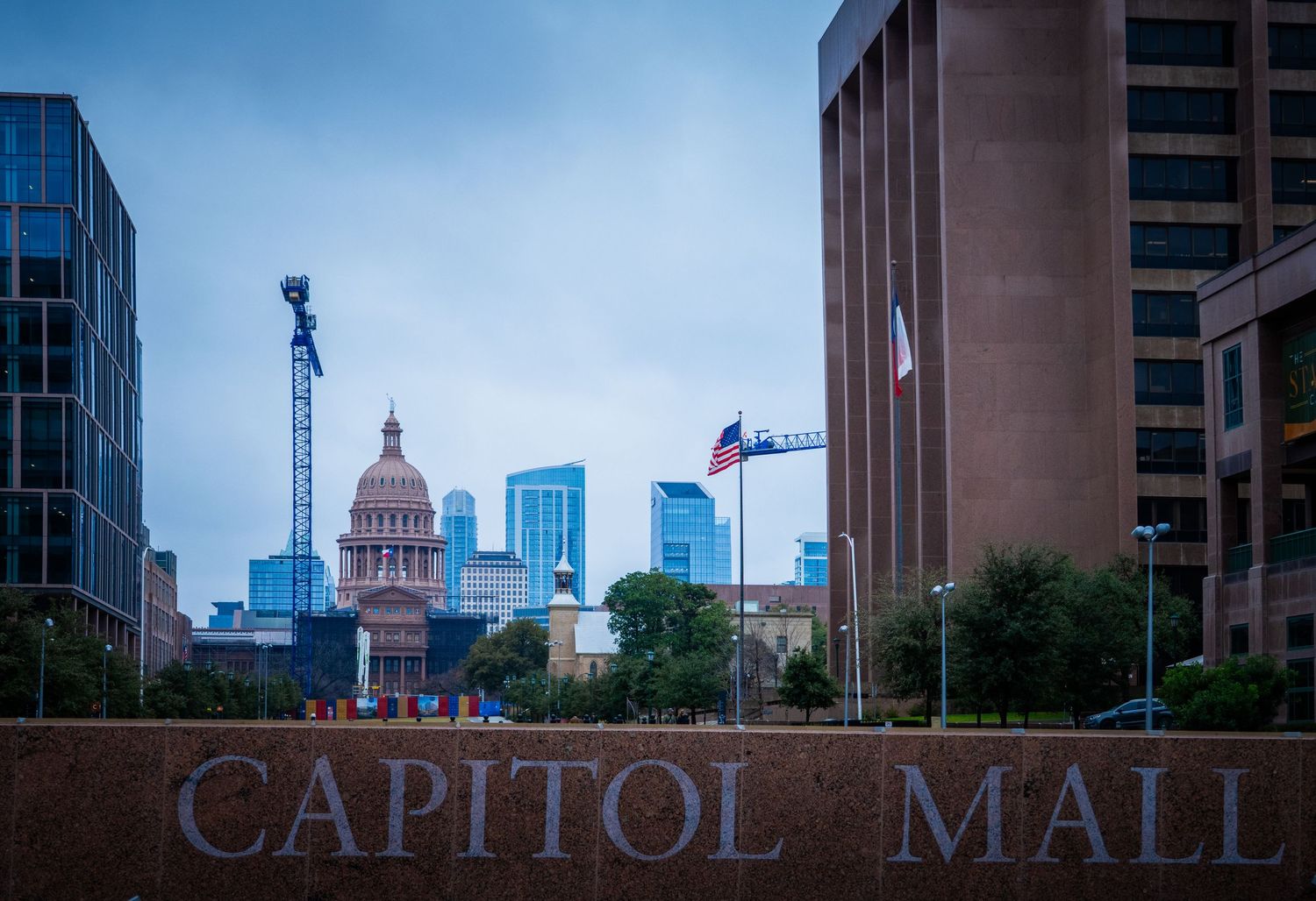 View of the Texas State Capitol building and surrounding urban landscape.