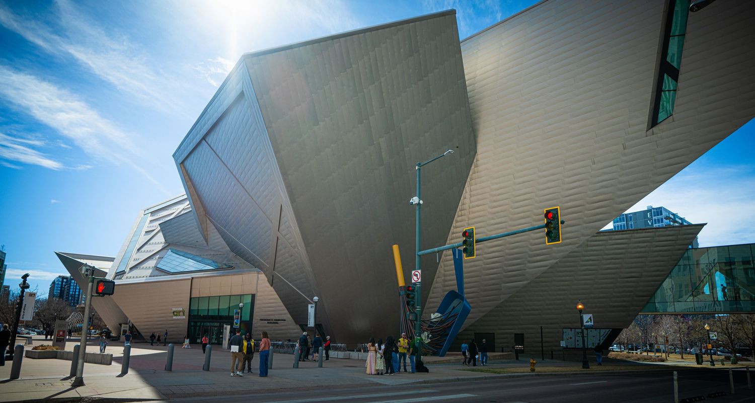 Panoramic collage of the Denver Art Museum's angular modern architecture against a bright blue sky.