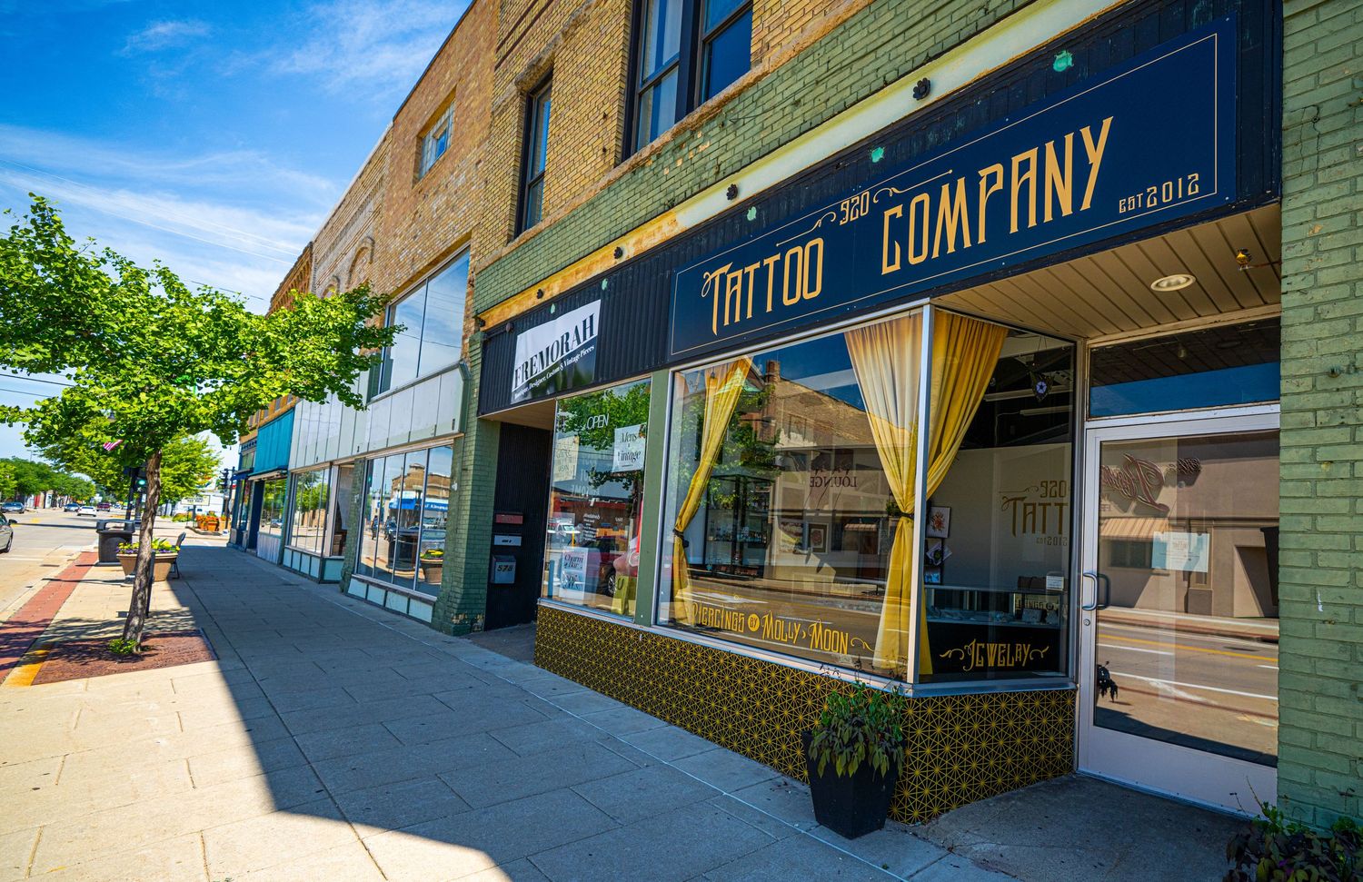 Vintage storefront of Coffee Company with classic awning and window displays.