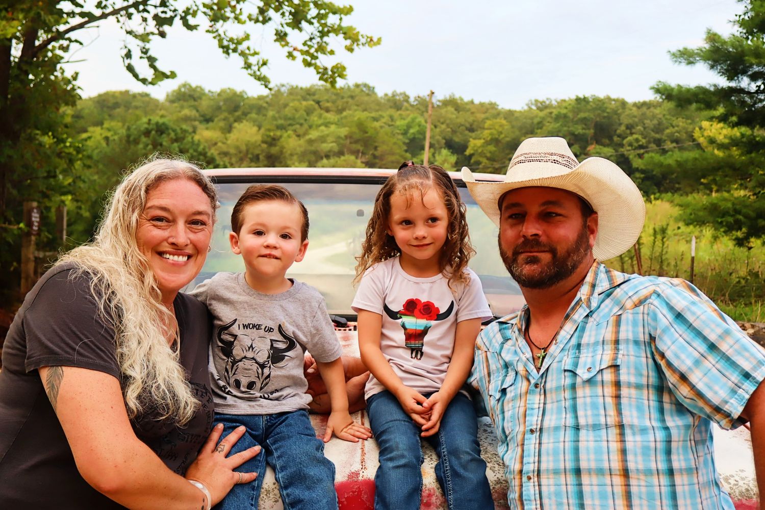 Family picture with their retro truck, having fun and enjoying the kids.