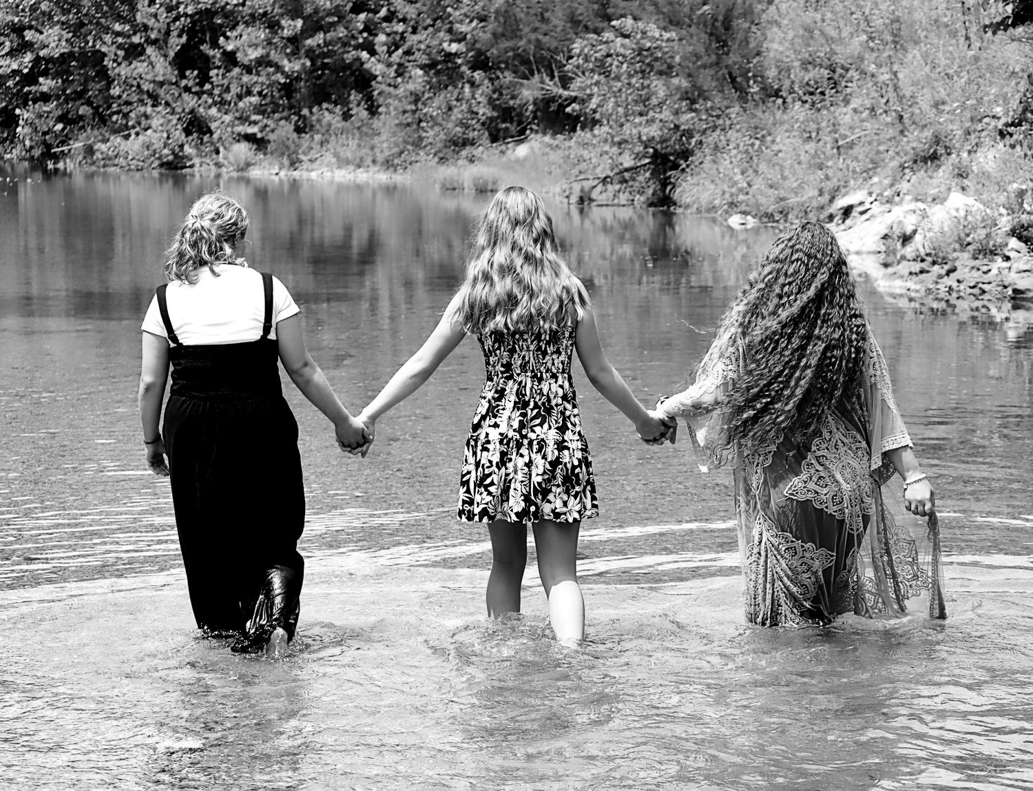 Picture of this woderful trio walking in the creek side-by-side.