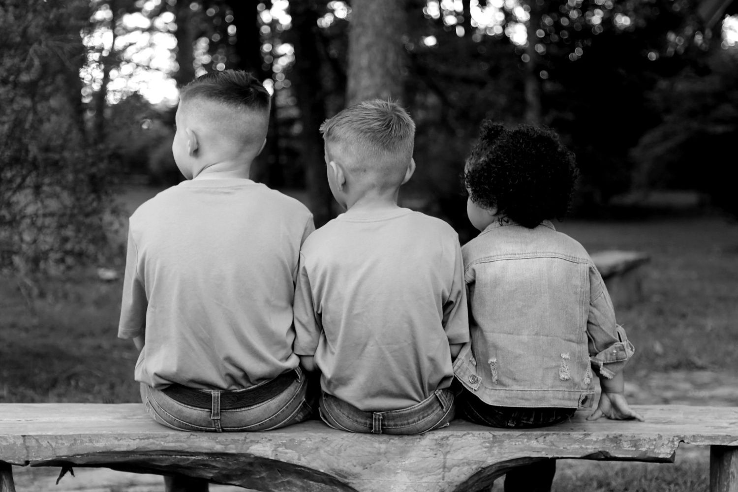 A wonderful photo of young kids with there parents having fun.