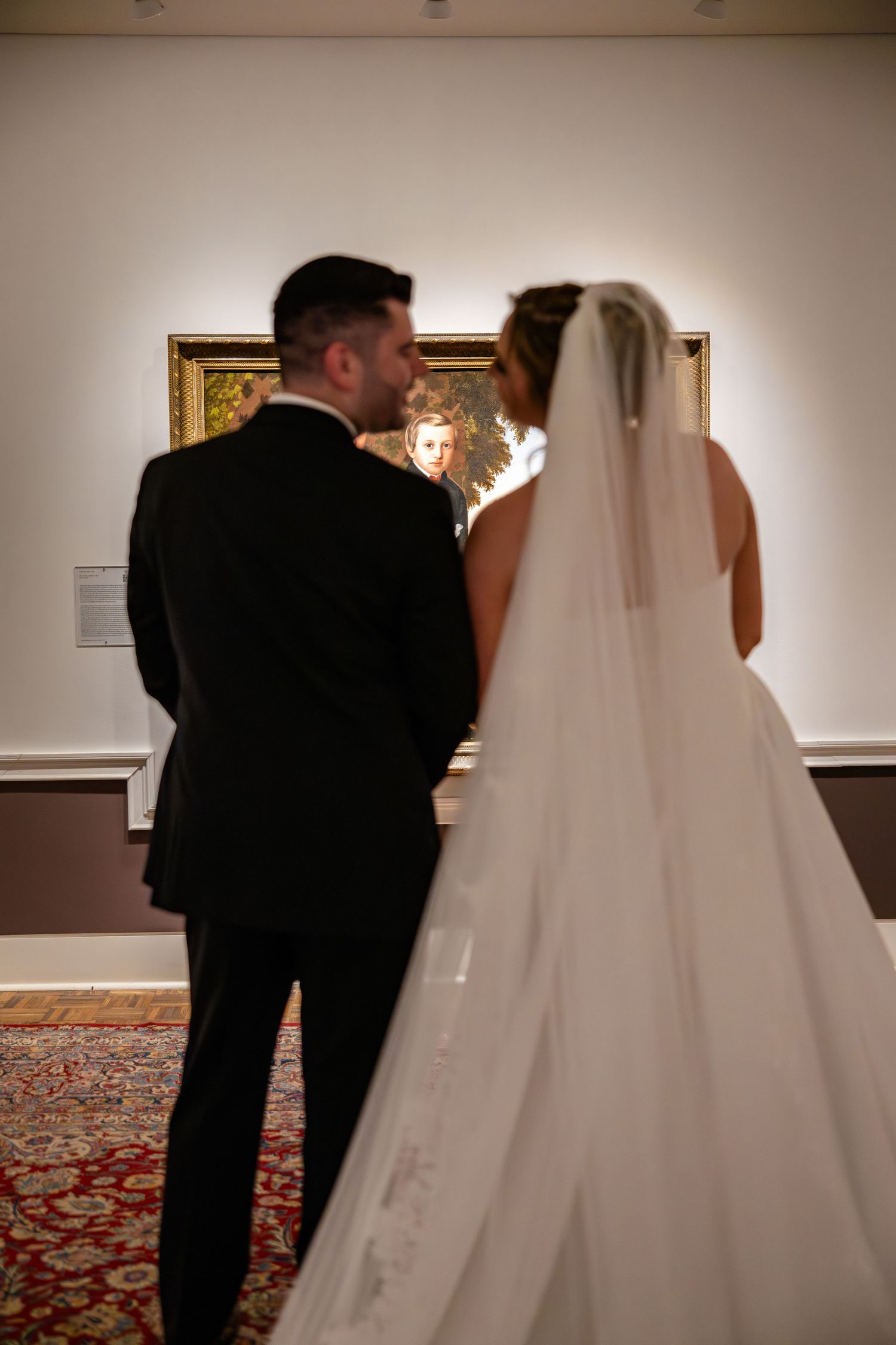 A sequence of romantic wedding photos showing a couple in formal attire sharing an intimate moment in an elegant venue.