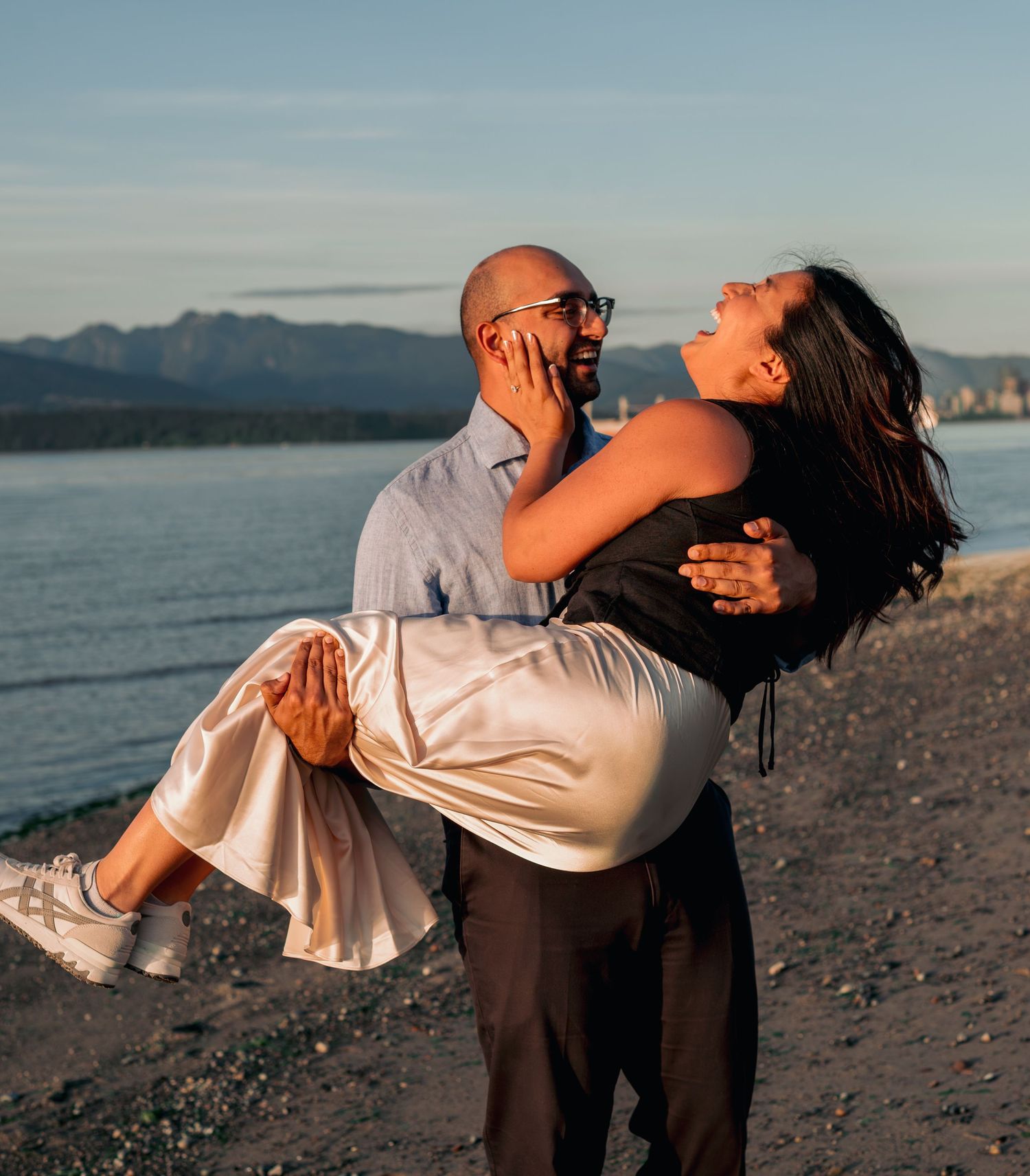 man holding woman in his arms