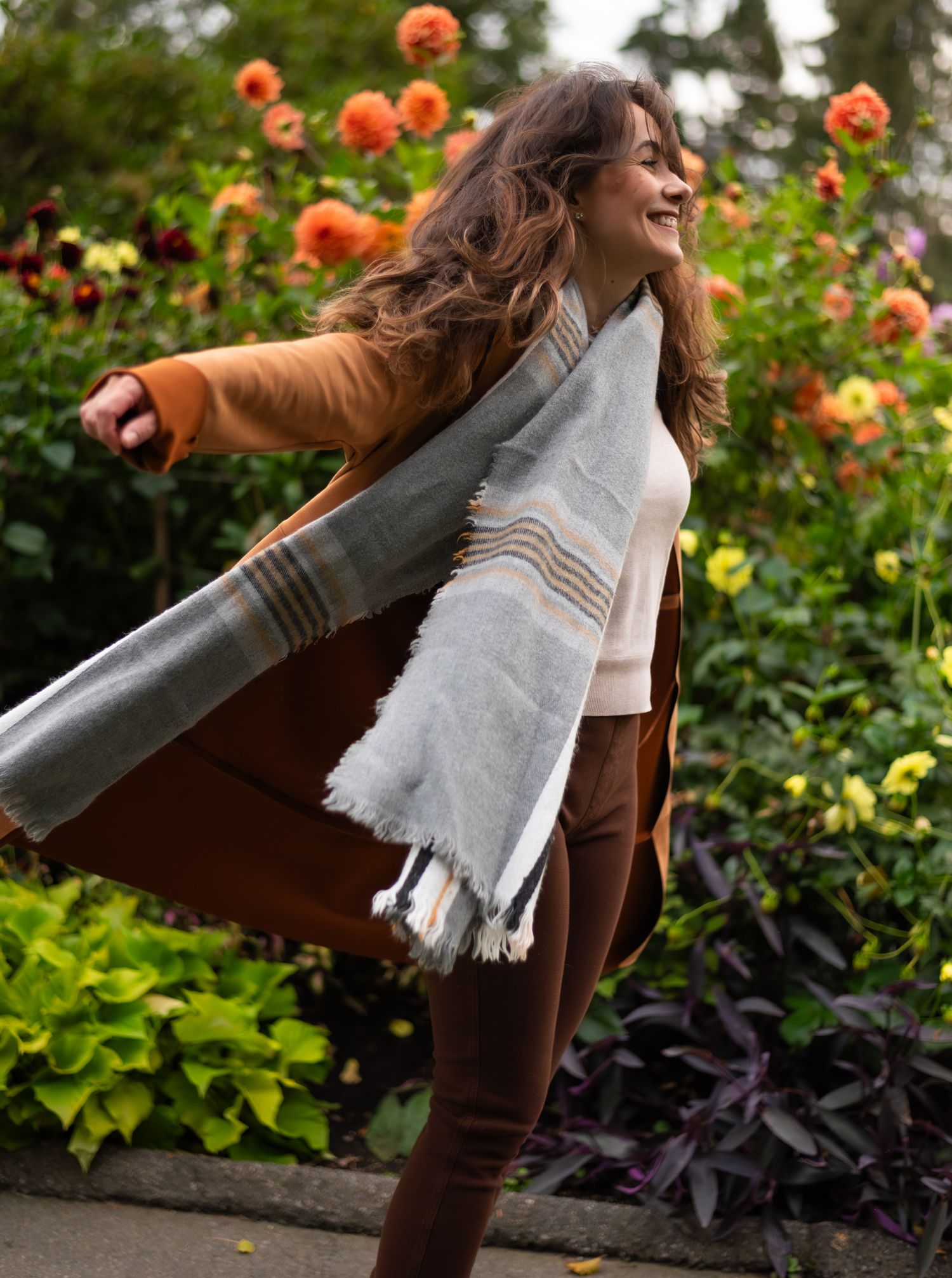 woman spinning and smiling