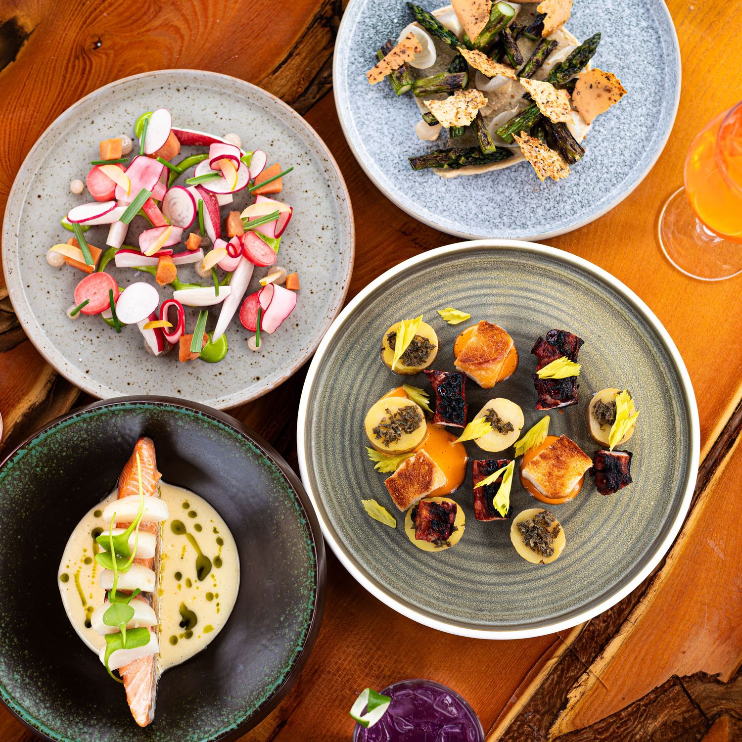mutliple farm to table fresh colourful dishes on a table