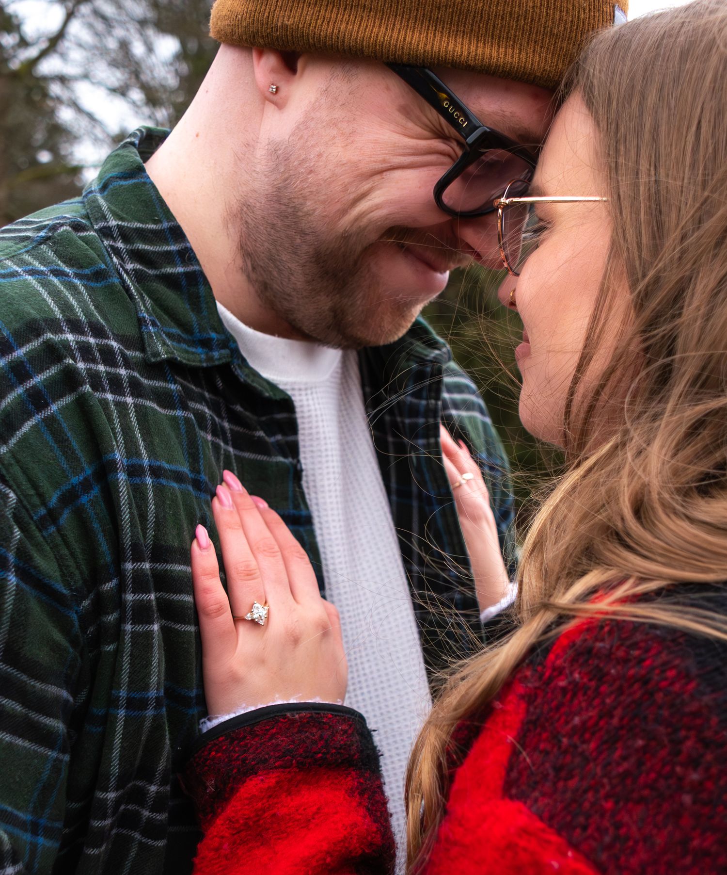 man and woman touching foreheads