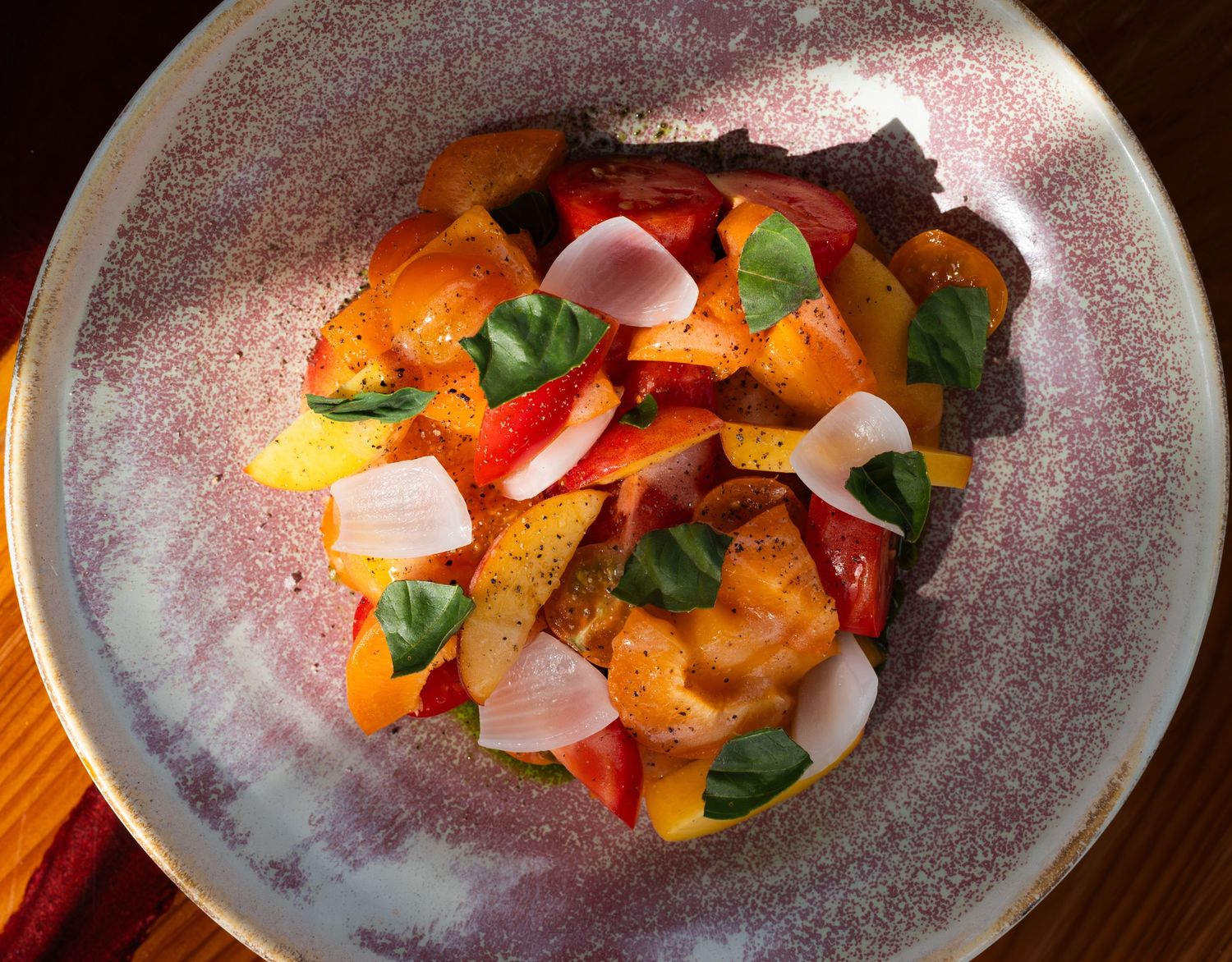 photo of a colourful tomato salad