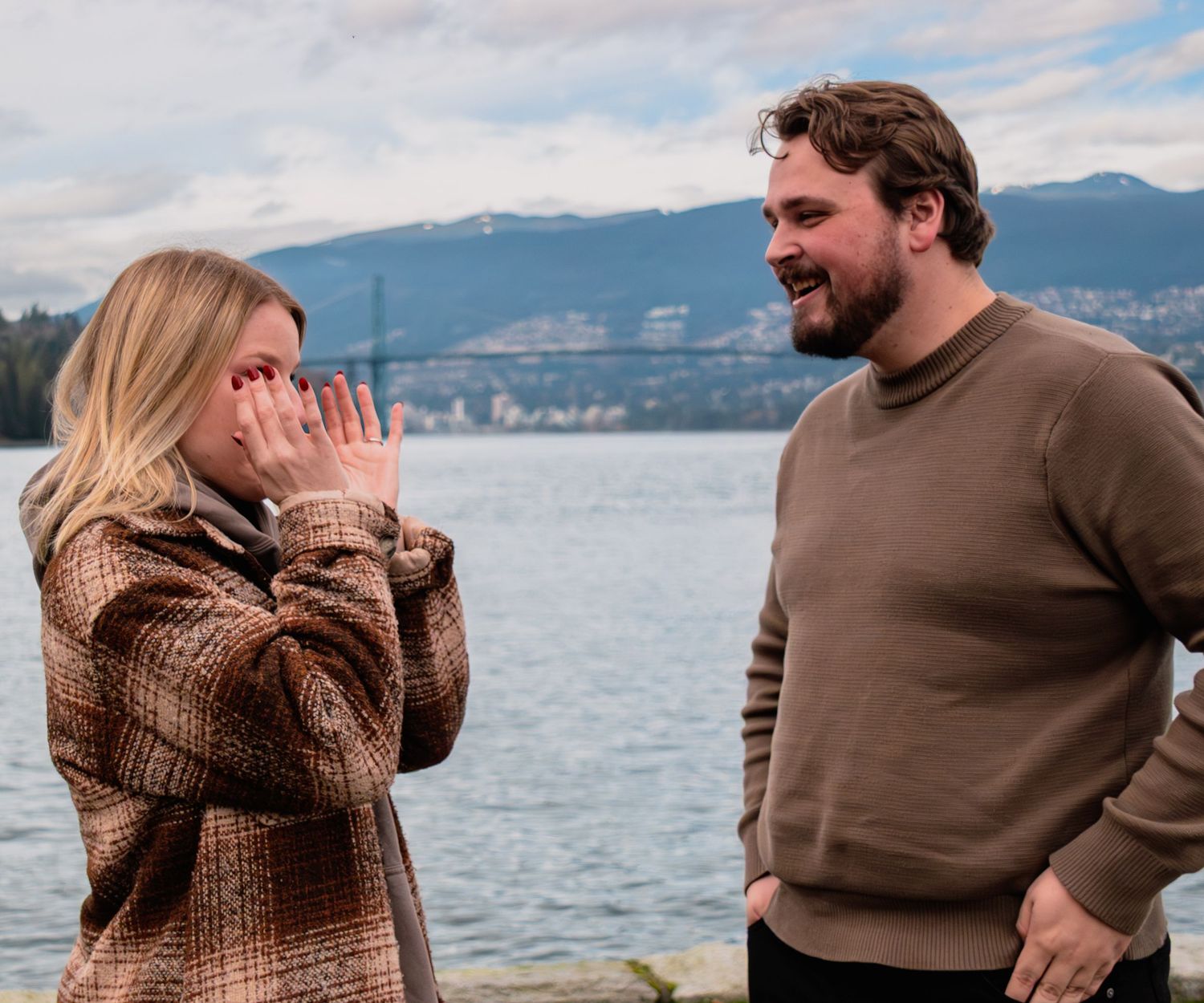 woman wiping her eyes after fiance proposes