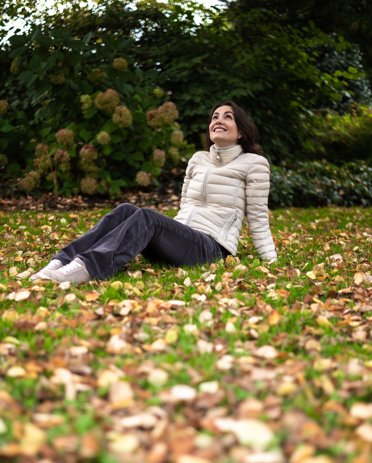 woman sitting on grass