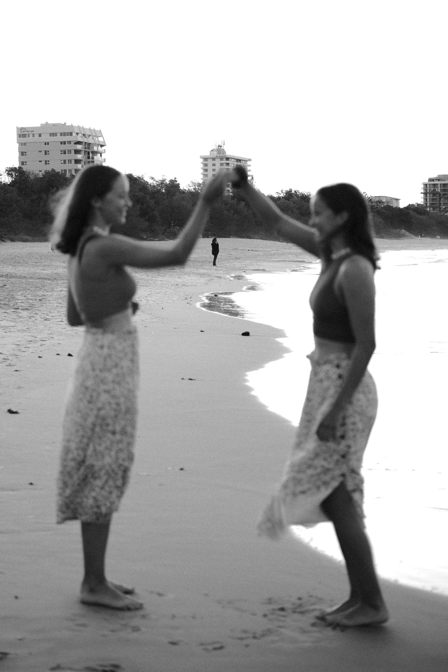 black and white, sisterhood, moody street photography, urban contrast, cinematic tones, light and shadow, aesthetic vibes
